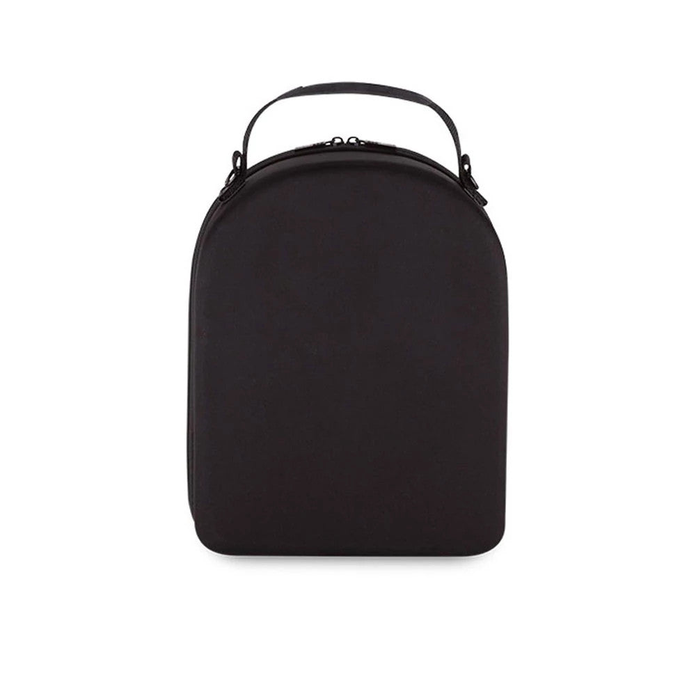 New Era 6 Pack Black Cap Carrier, front view showing the rounded black shell with a carry handle fixed to the top, subtle seams outlining the edges, and no visible logos or eyelets on the front surface.