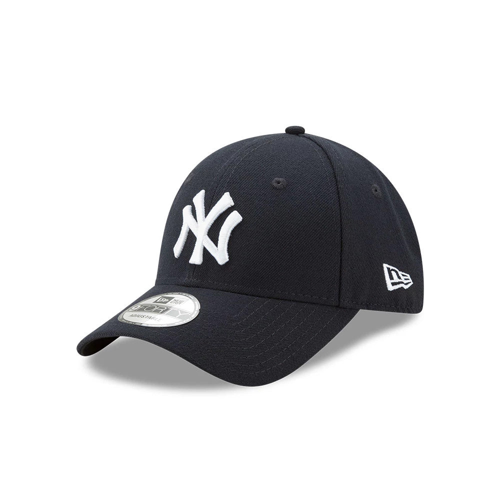 New York Yankees The League Blue New Era 9FORTY Cap, three-quarter view showing white raised embroidery NY logo on the front panel, curved visor with 9FORTY size sticker, and New Era flag logo on the left side.