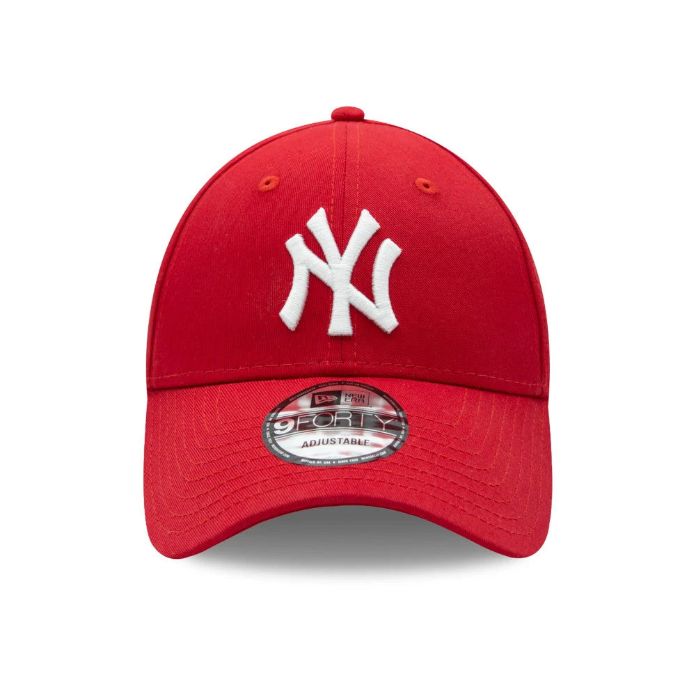New York Yankees Essential Red New Era 9FORTY Cap, front view showing the raised white embroidered NY logo on the structured red crown, curved red visor with a 9FORTY size sticker on top and matching top button and eyelets.