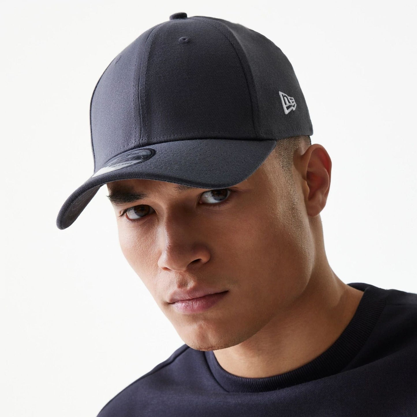 This is a New Era Flag Graphite Grey 39THIRTY Cap 5