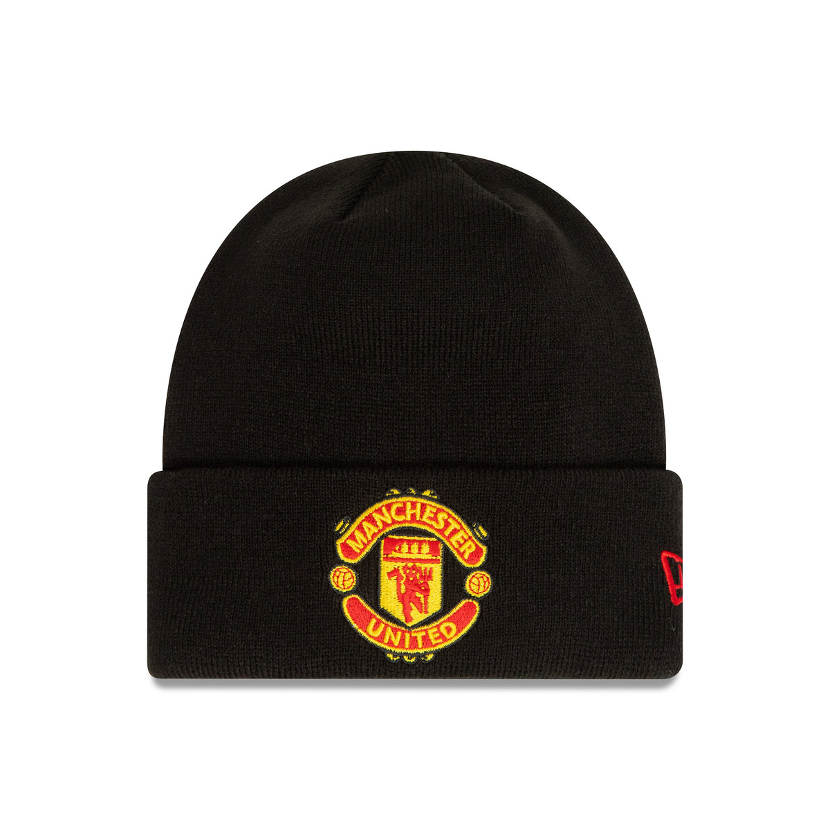 Manchester United Essential Black Beanie Hat, front view showing the red and yellow embroidered club crest on the centre of the cuff with an additional red New Era flag logo on the left side.