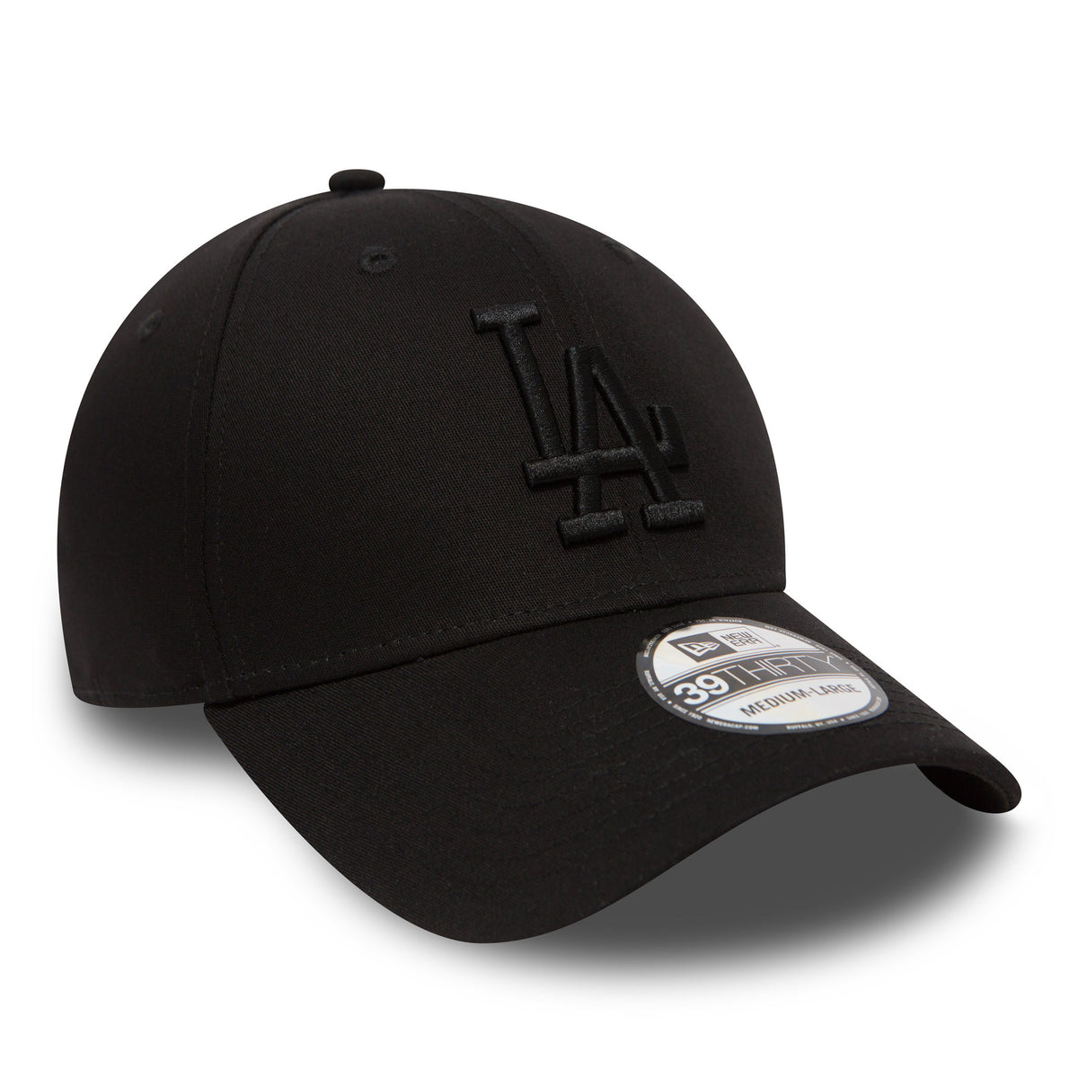 LA Dodgers Essential Black On Black New Era 39THIRTY Cap, three-quarter view showing raised black LA logo embroidery on the front panel, with a 39THIRTY size sticker on the curved visor and a matching top button.