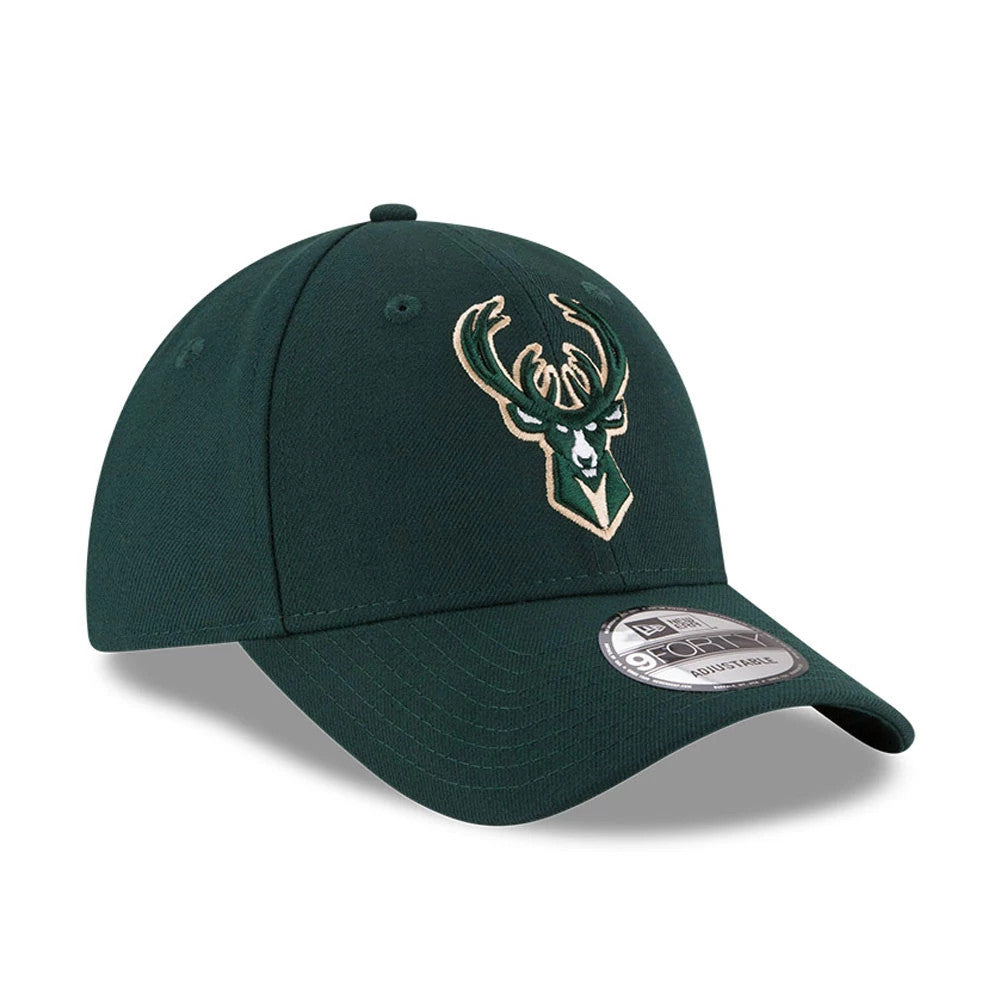 Milwaukee Bucks The League Green New Era 9FORTY Cap, three-quarter view showing the raised embroidered Bucks logo on the front panel, featuring a curved visor with a 9FORTY size sticker on top, and two eyelets on the side.