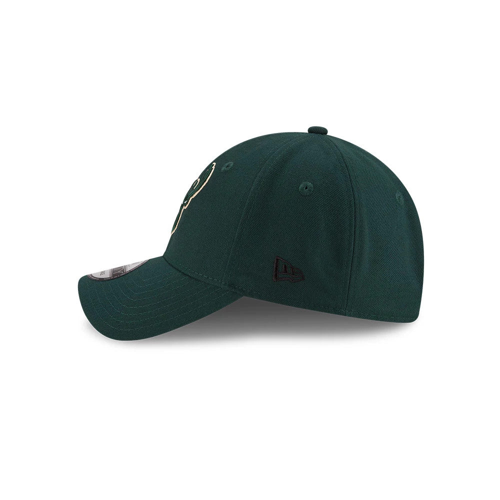 Milwaukee Bucks The League Green New Era 9FORTY Cap, side view showing the black embroidered New Era flag logo on the left side, with a curved visor and a structured green crown featuring the Bucks logo on the front panel.