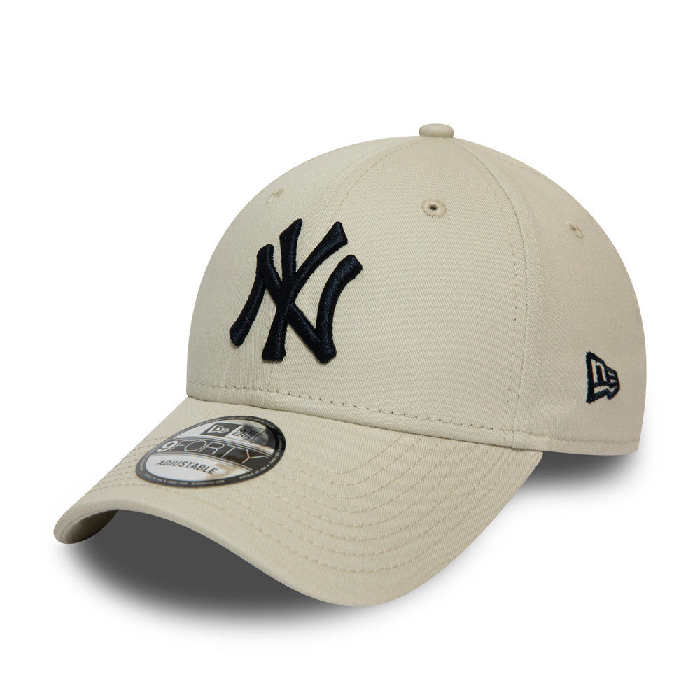 New York Yankees Essential Stone New Era 9FORTY Cap, three-quarter view showing the raised navy NY logo on the front panel, curved visor with 9FORTY size sticker, and New Era flag logo embroidered on the left side.
