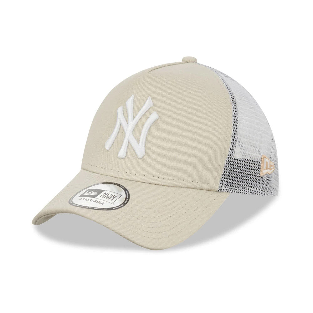 New York Yankees Stone A-Frame Trucker Cap, three-quarter view showing the white raised embroidered NY logo on the structured stone-coloured front panel, curved visor with an adjustable sticker, and white mesh side panels with a New Era flag logo on the left.