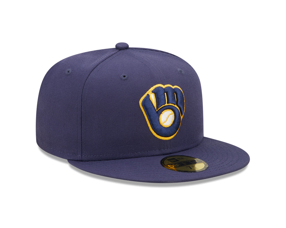Milwaukee Brewers AC Perf Navy New Era 59FIFTY Cap, three-quarter view showing the raised yellow and white embroidered logo on the navy front panel, with a flat visor and gold 59FIFTY size sticker on top.