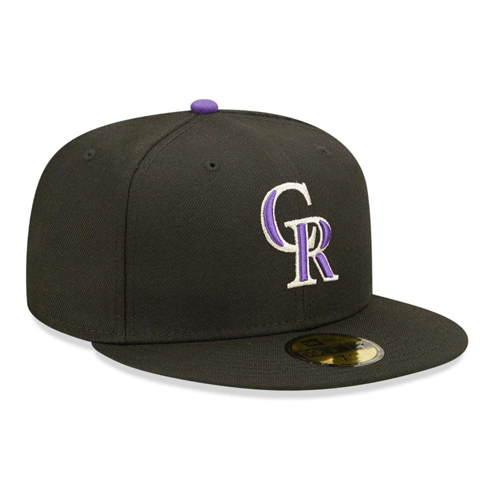 Colorado Rockies Authentic On Field Black New Era 59FIFTY Cap, three-quarter view showing raised white and purple embroidered CR logo on the front panel and gold 59FIFTY size sticker on the black flat visor.