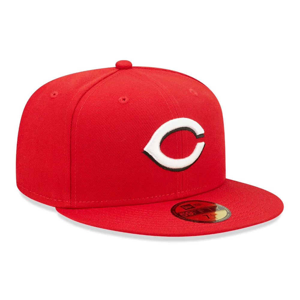 Cincinnati Reds AC Perf Red New Era 59FIFTY Cap, three-quarter view showing the raised white embroidered C logo on the front panel, with a red flat visor and a gold 59FIFTY size sticker on top.