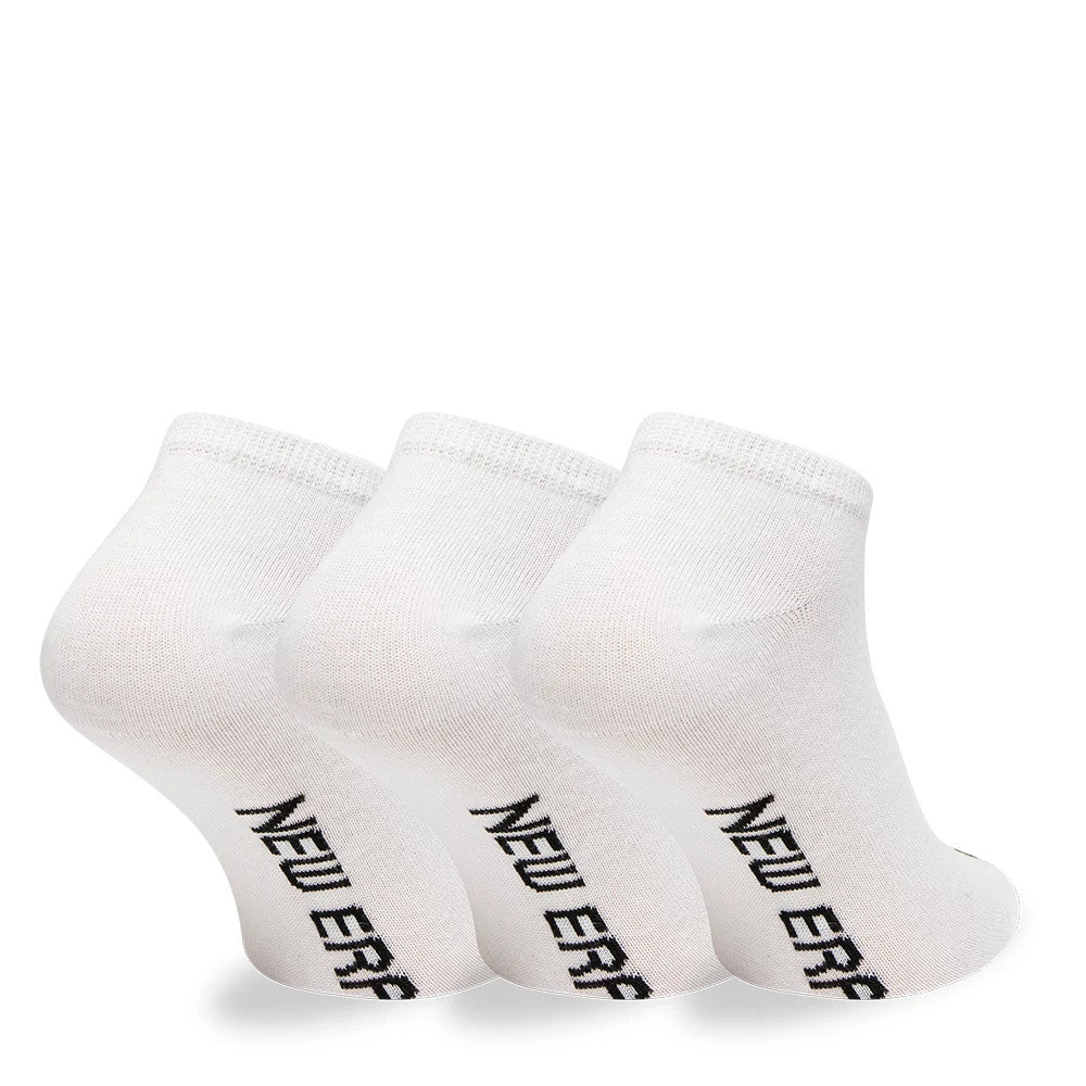 New Era Flag Sneaker 3 Pack White Socks, angled view showing three white socks aligned side by side with the black New Era logo running vertically along the outer side of each sock.