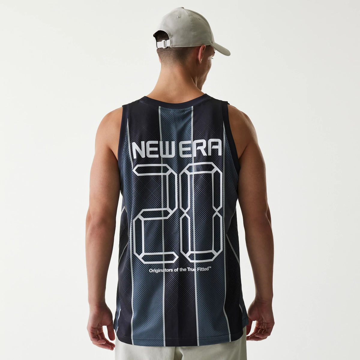 New Era City Sport Black Tank Top, back view on a model wearing a grey cap, featuring NEWEA 20 lettering in a digital style across the upper back of a mesh design with vertical stripes.