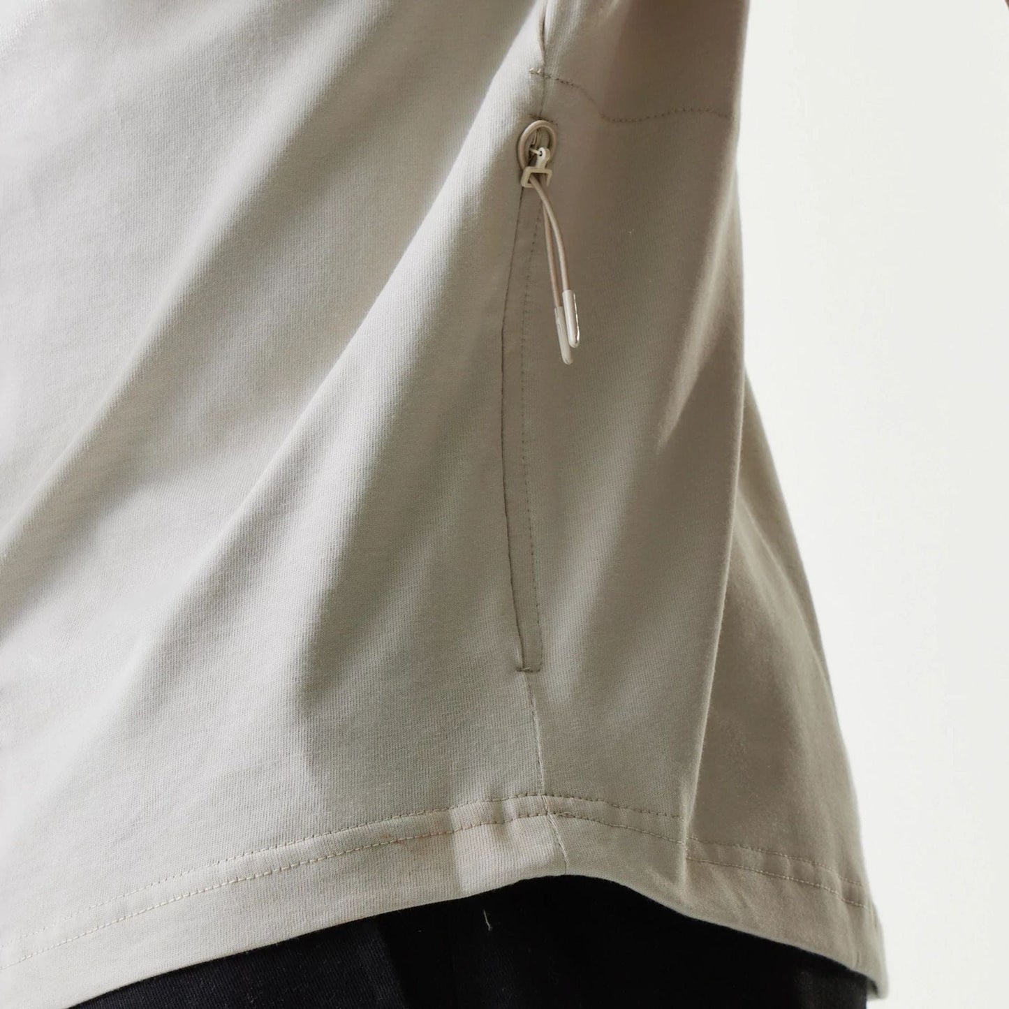 The Male model is wearing New Era Outdoor Earth Day Stone T-Shirt 7