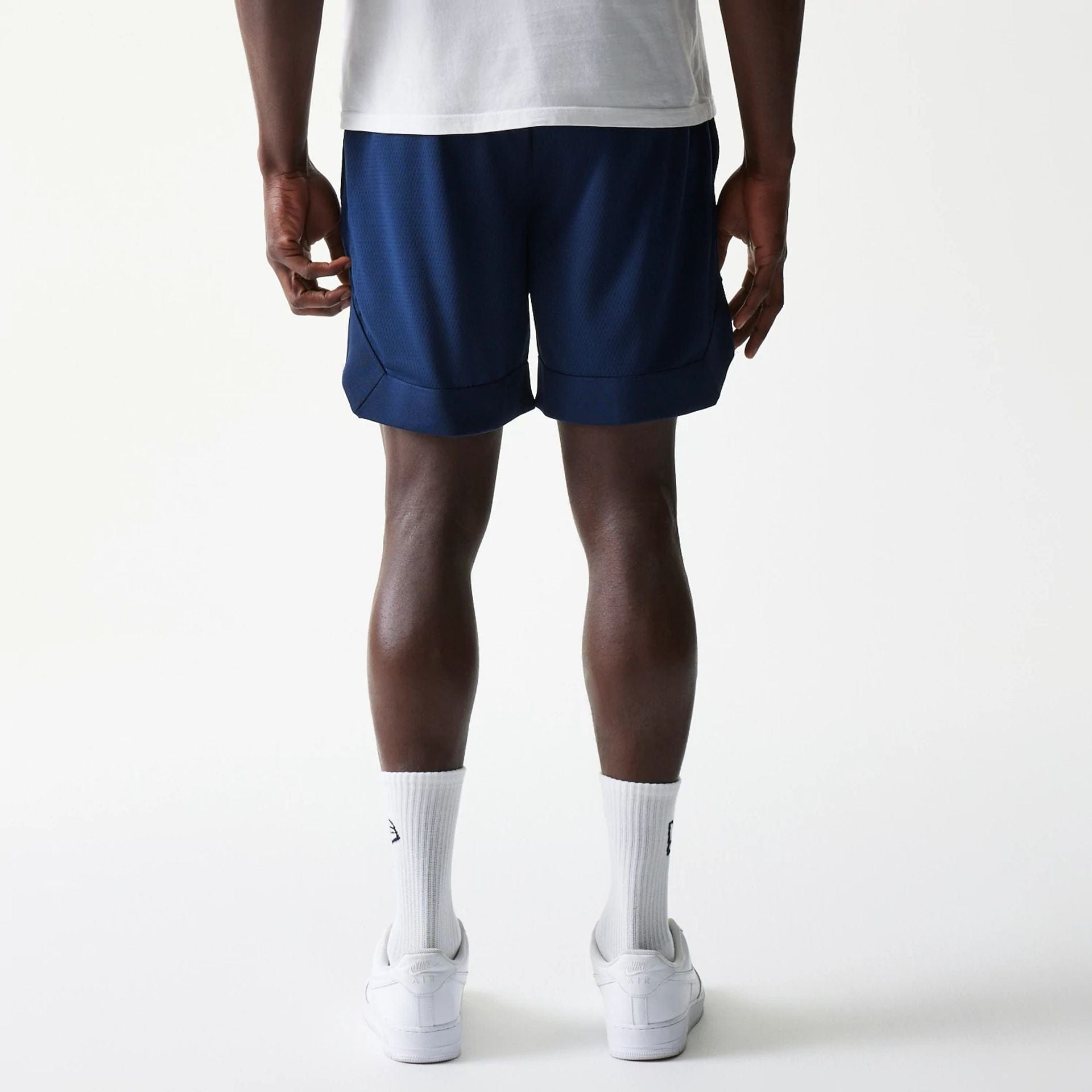 The Male model is wearing New York Yankees Tonal Pack Blue Shorts 2