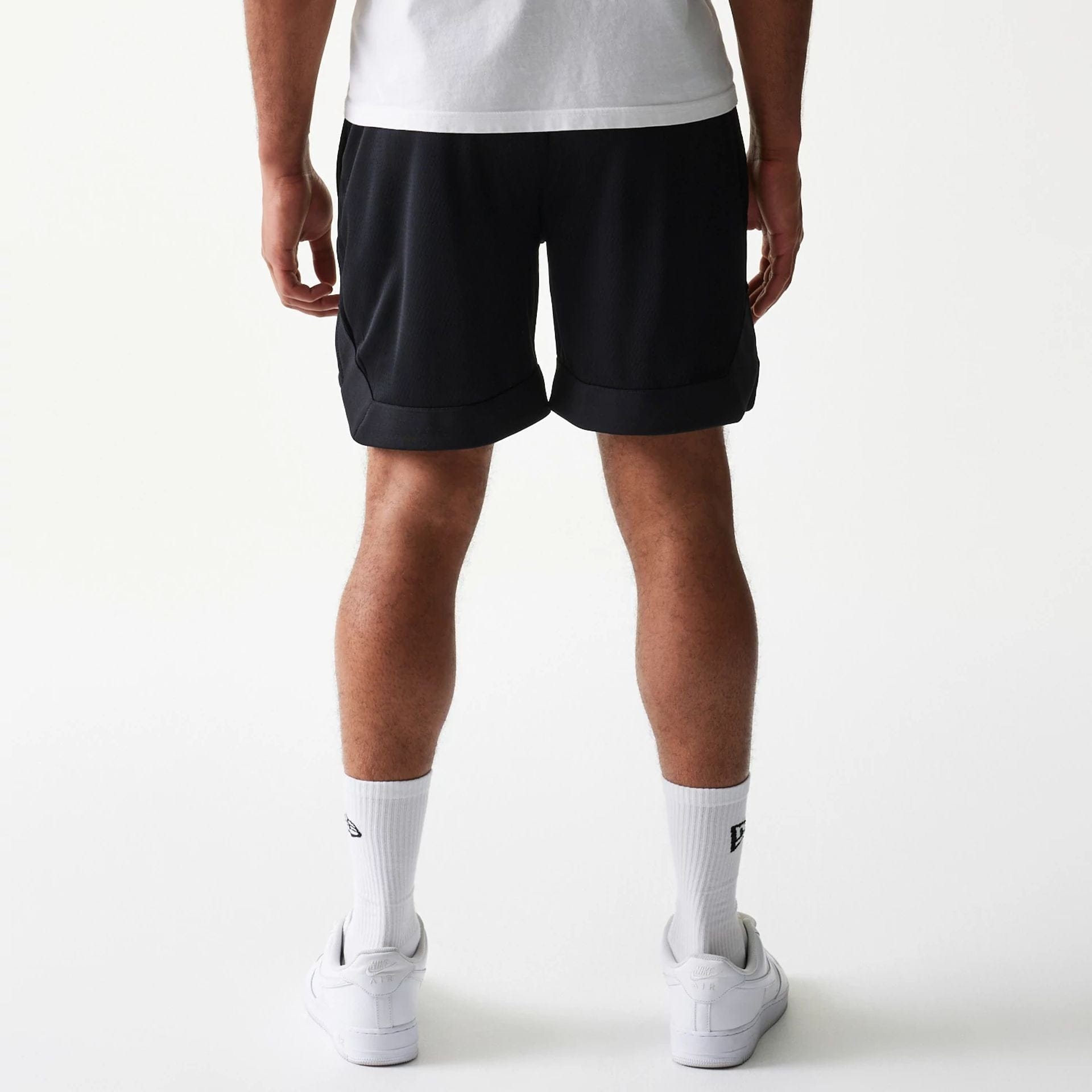 The Male model is wearing Las Vegas Raiders Tonal Pack Black Shorts 2