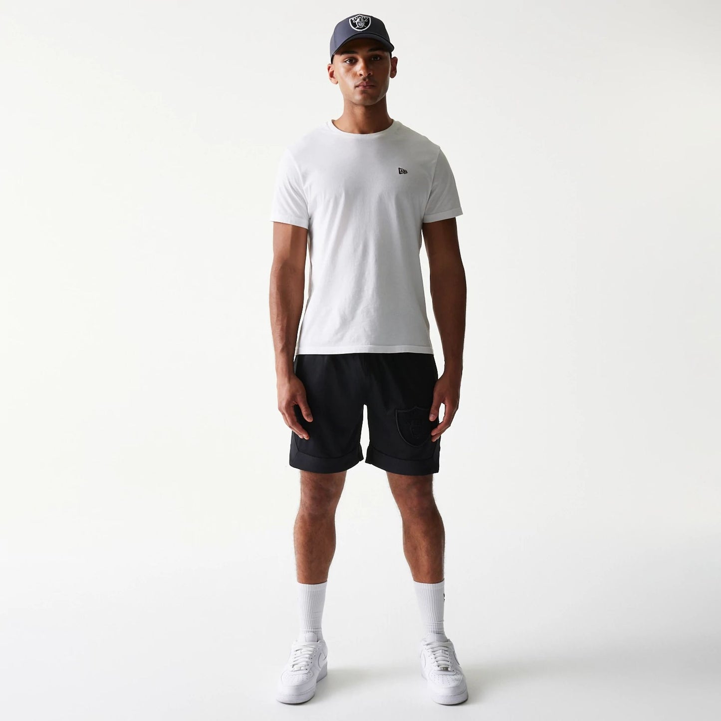 The Male model is wearing Las Vegas Raiders Tonal Pack Black Shorts 8