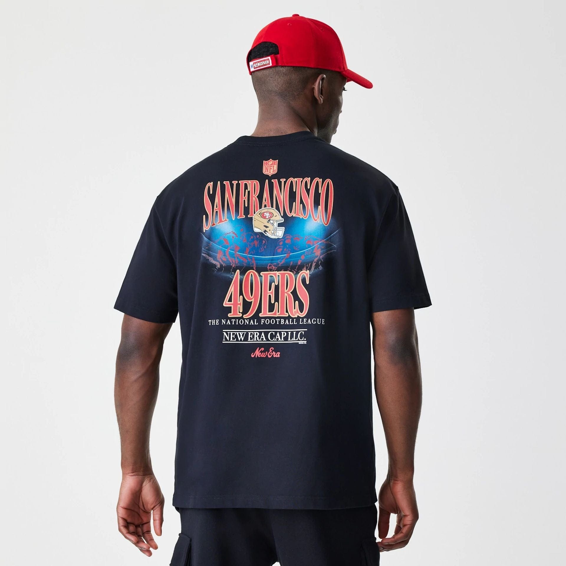 The Male model is wearing San Francisco 49ers NFL Black Oversized T-Shirt 2