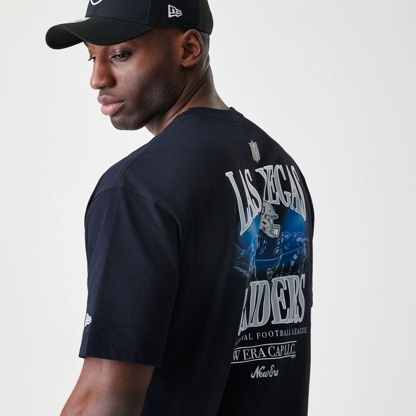 The Male model is wearing Las Vegas Raiders NFL Black Oversized T-Shirt 6