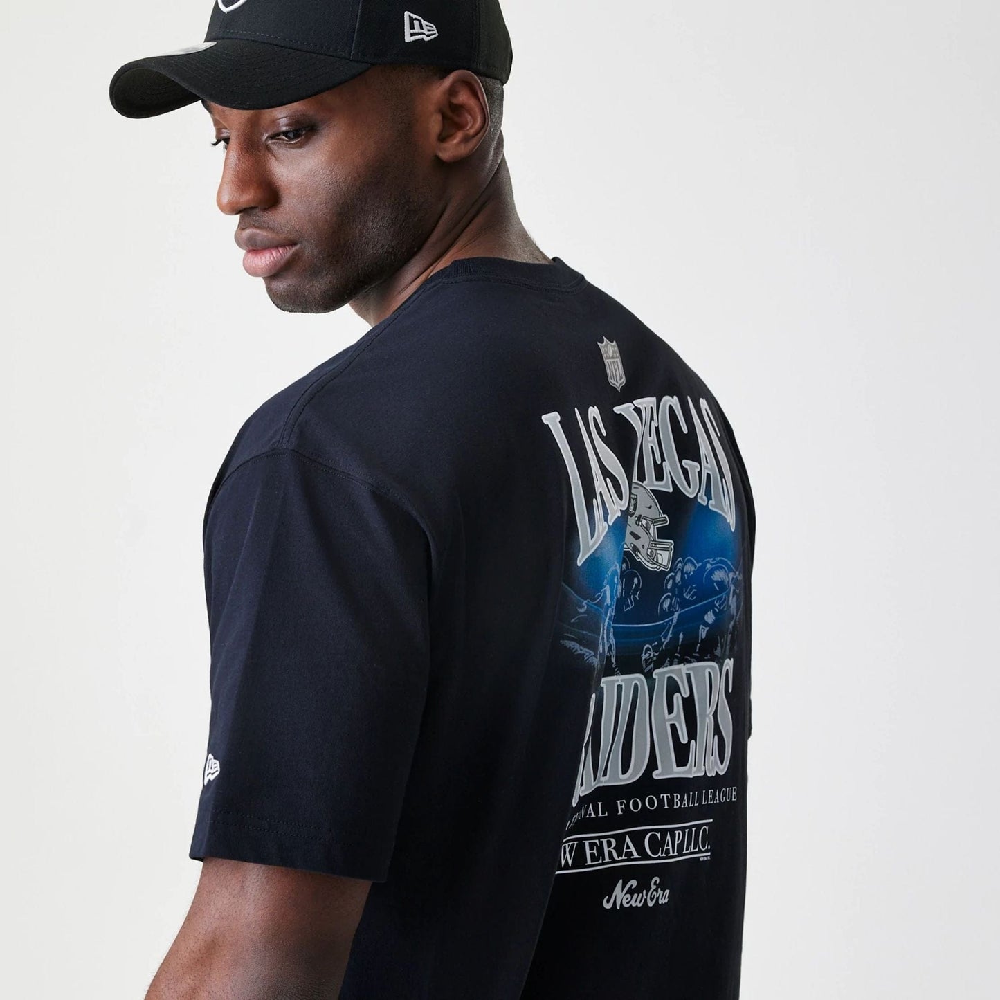 The Male model is wearing Las Vegas Raiders NFL Black Oversized T-Shirt 6