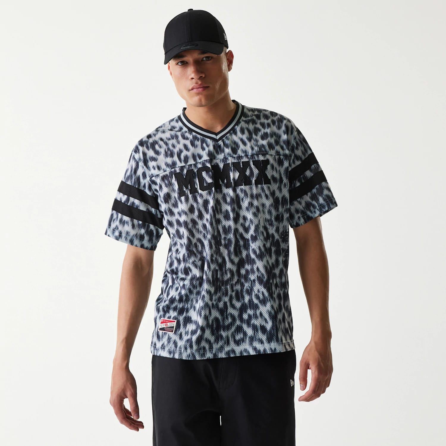 The Male model is wearing New Era Retro Sports Grey Mesh Jersey 1