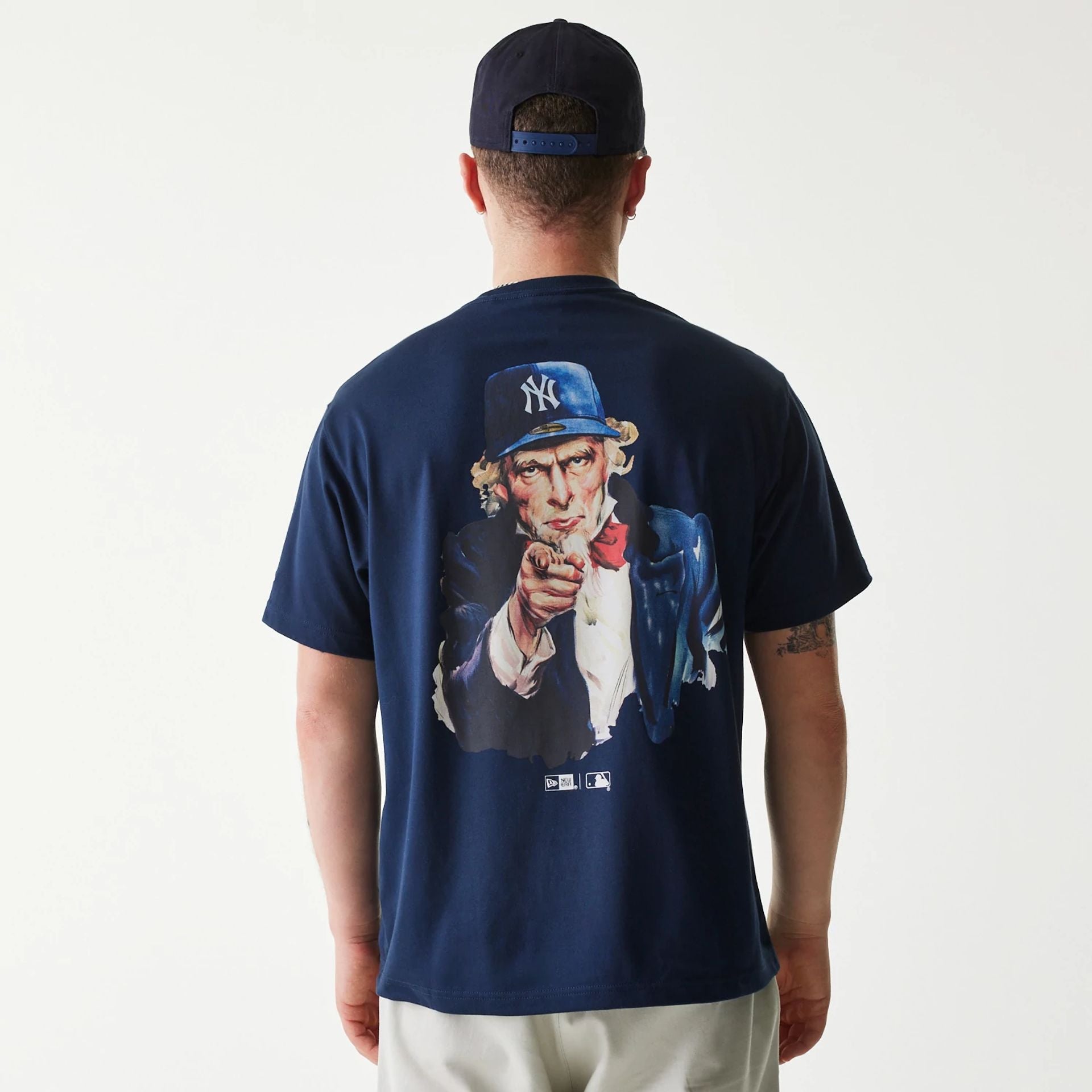 The Male model is wearing New York Yankees MLB Uncle Sam Navy T-Shirt 2