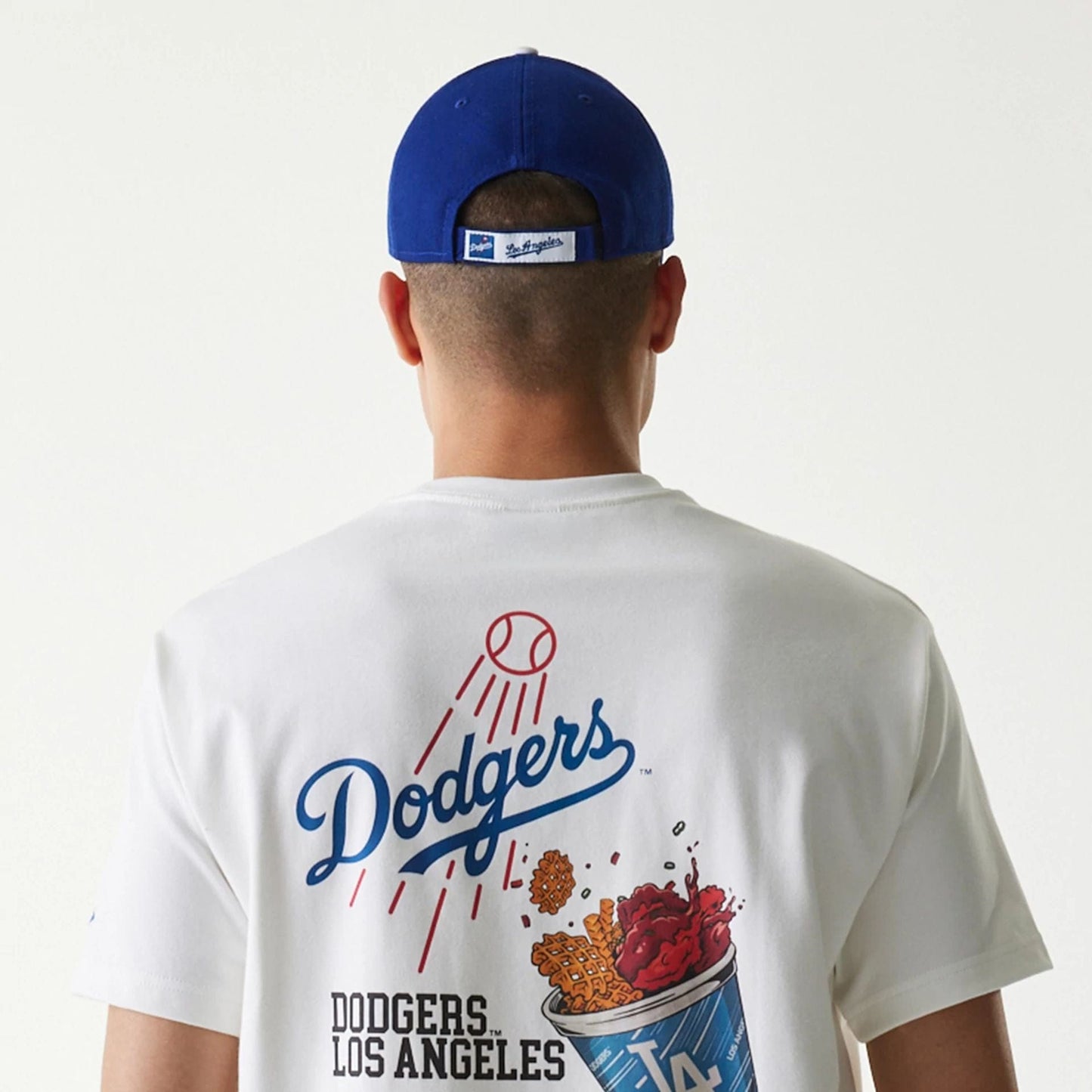 The Male model is wearing LA Dodgers MLB Cheering Food White T-Shirt 7