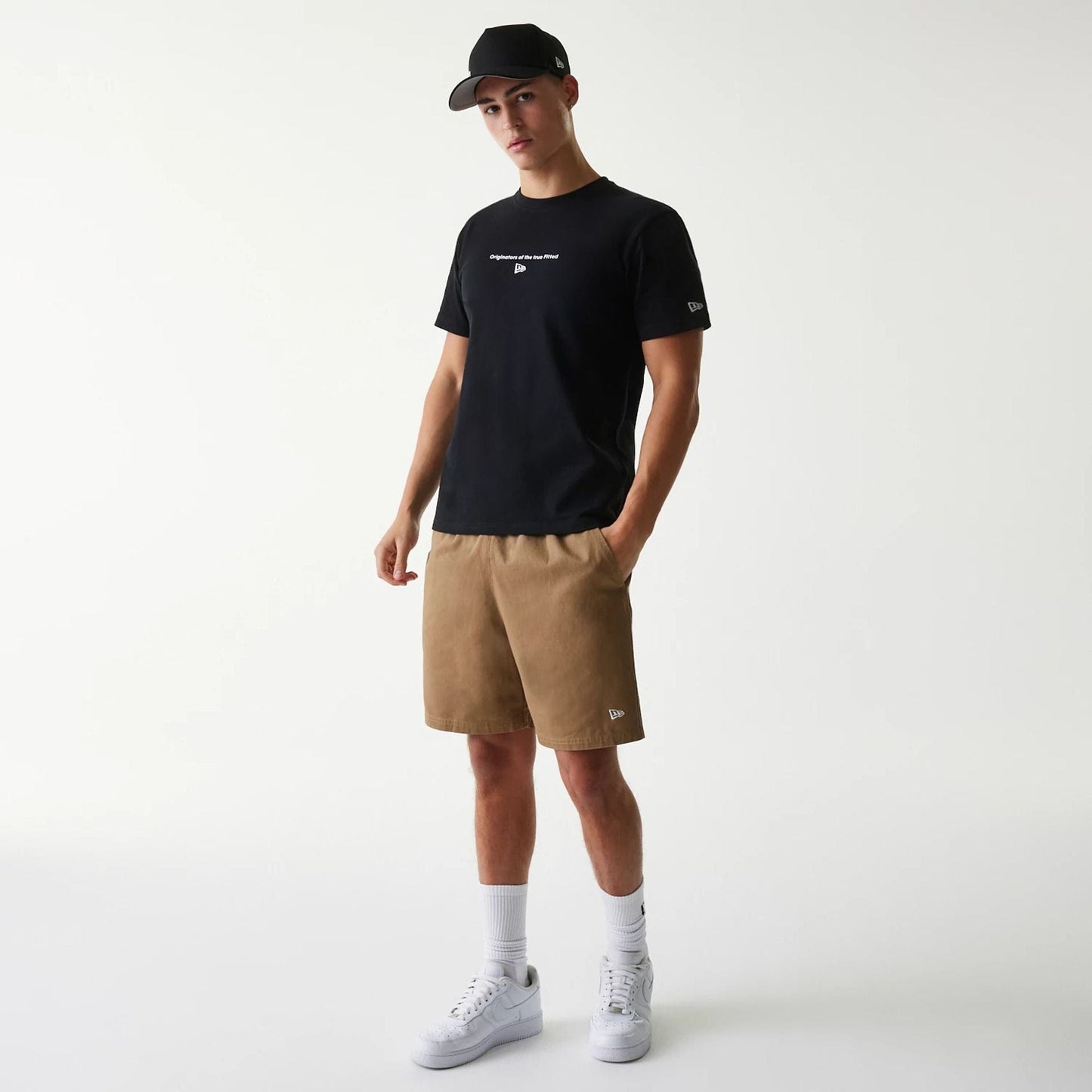 The Male model is wearing New Era Japan Circle Black T-Shirt 7