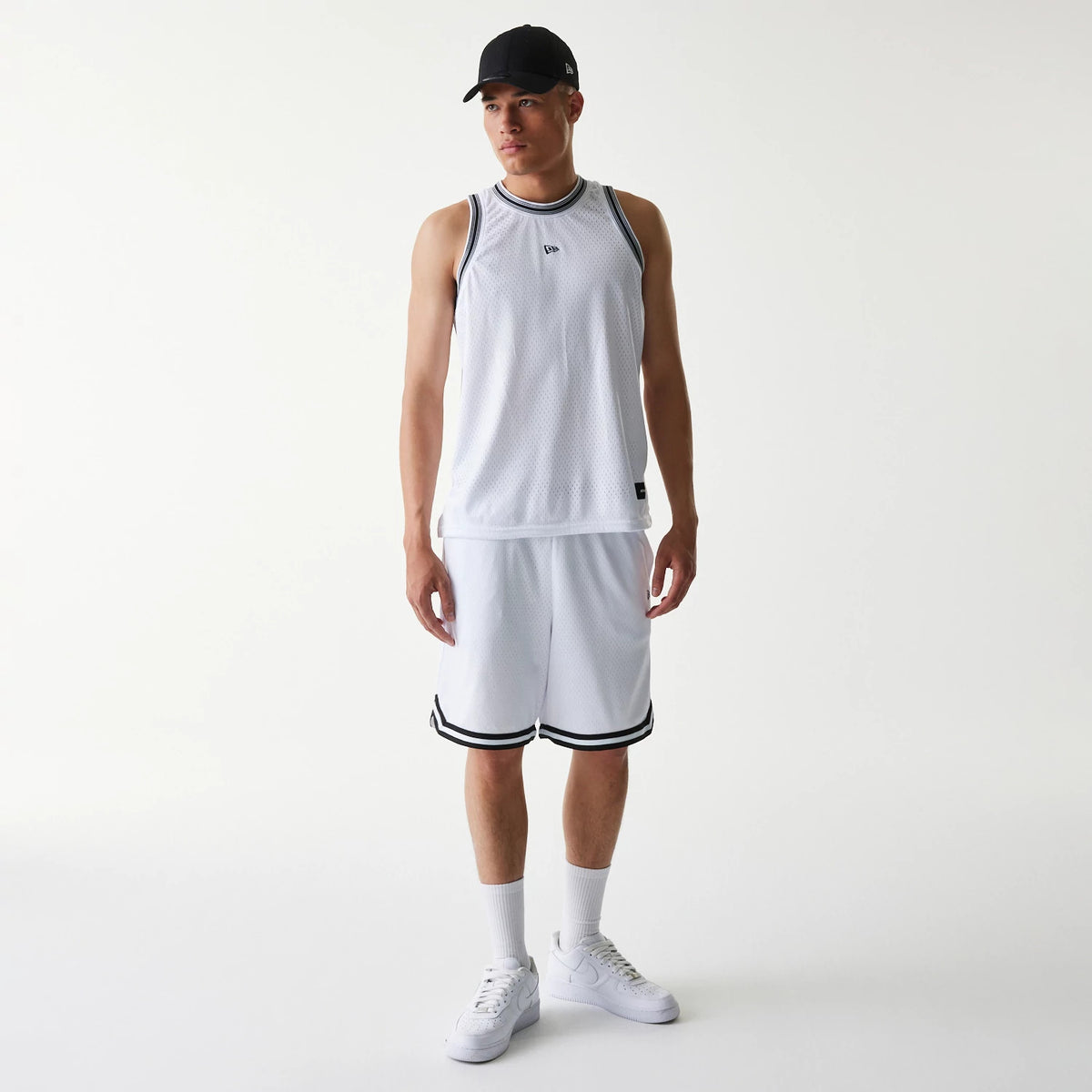 The Male model is wearing New Era Japan Mesh White Sleeveless T-Shirt 7