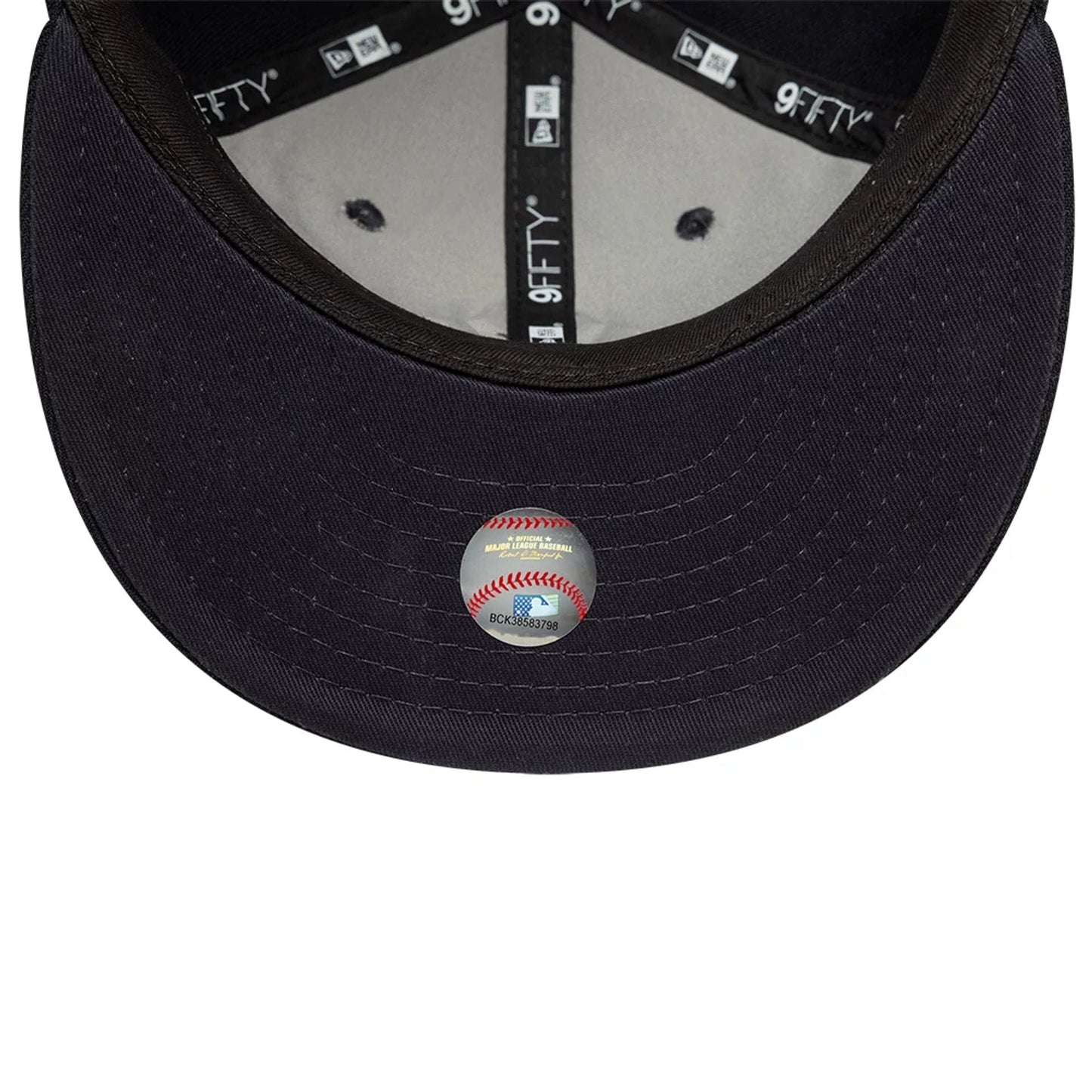 This is a New York Yankees MLB X Saint Mxxxxxx Navy Retro Crown 9FIFTY Snapback Adjustable Cap 7