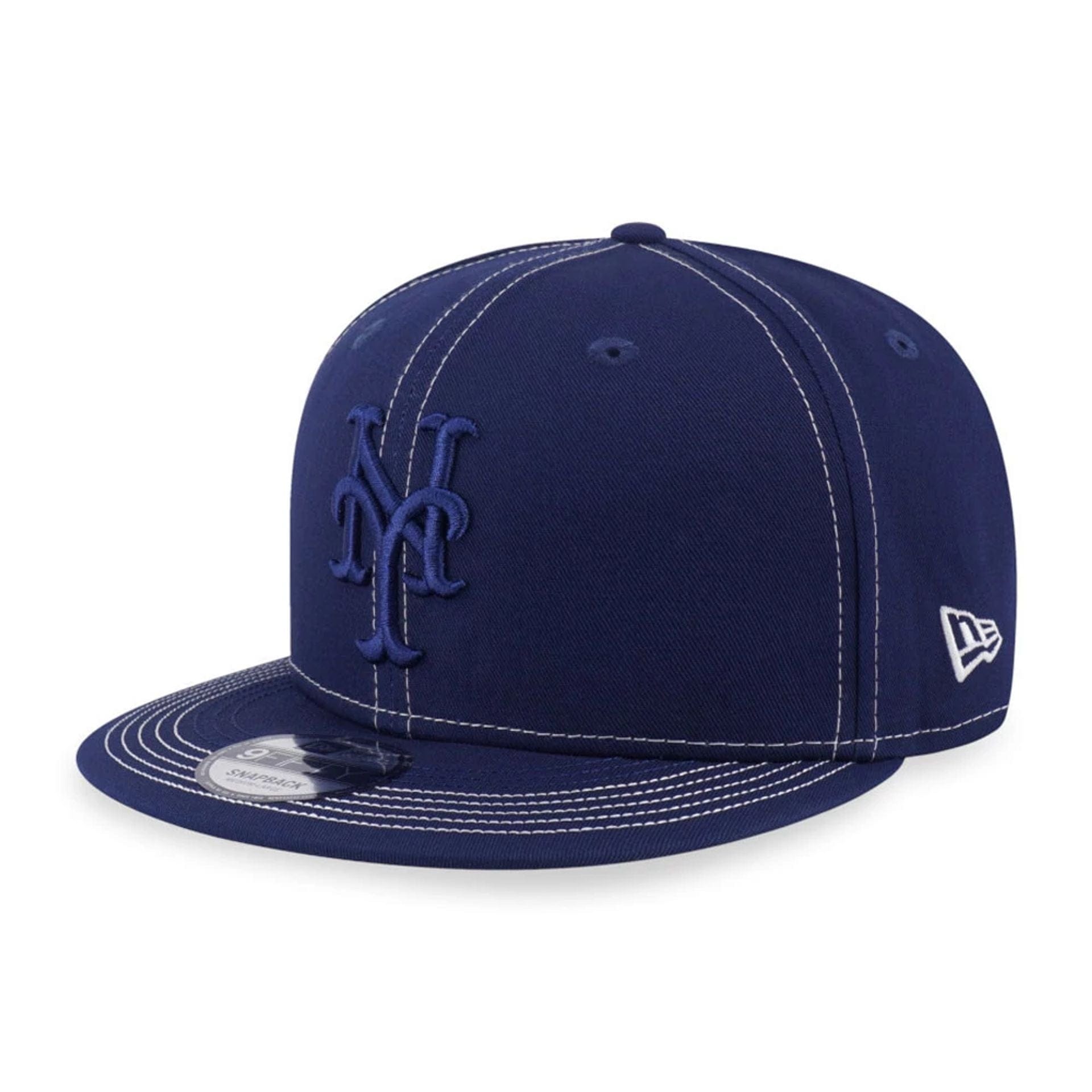 Pictured is this MLB Contrast Stitching New York Mets 9FIFTY Snapback cap in dark blue. 1