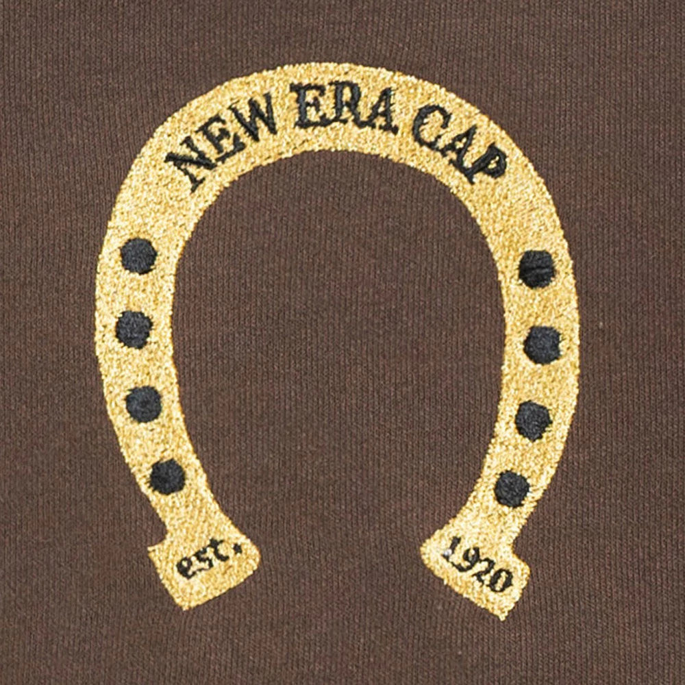 New Era Year Of The Horse Brown T-Shirt, front view showing an embossed horseshoe design with the words "New Era Cap" at the top and "est. 1920" at the bottom, in gold and black on a brown background.