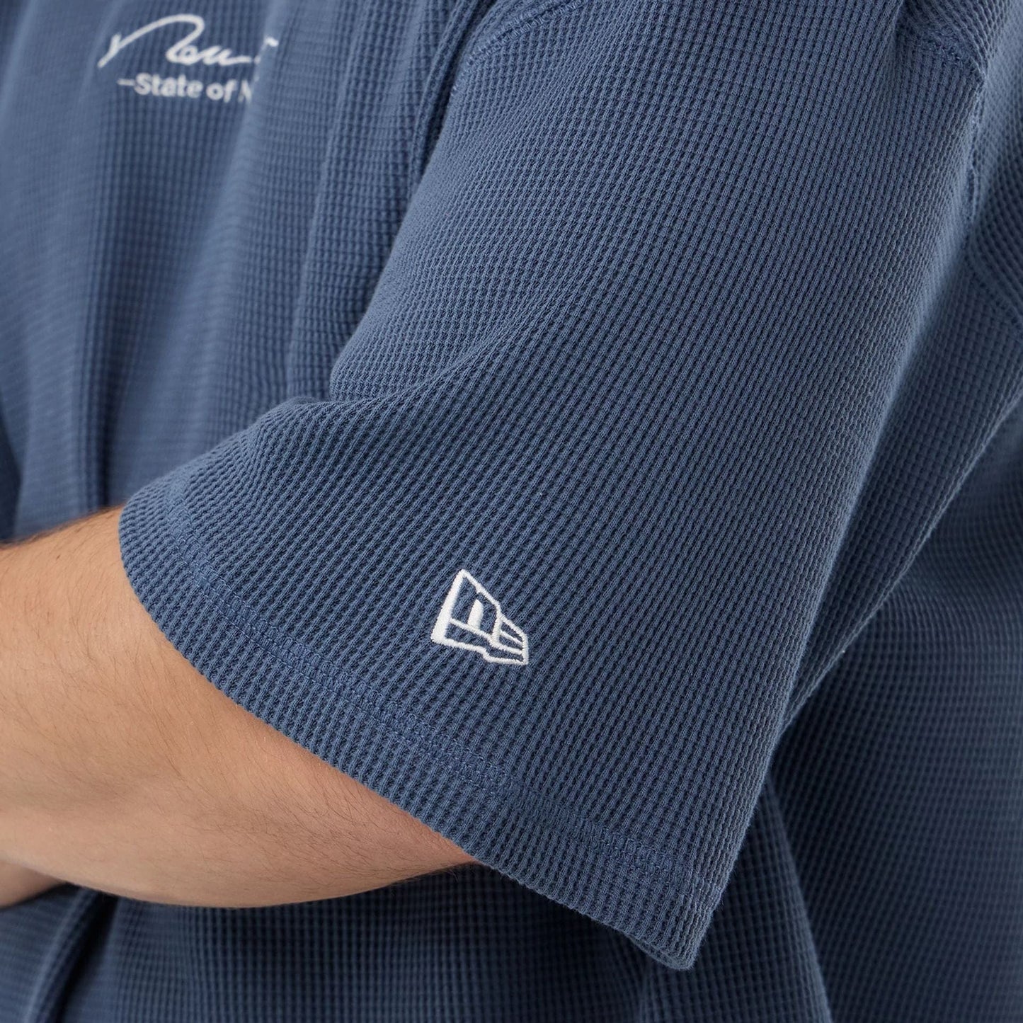 The Male model is wearing New Era Basic Blue T-Shirt 7