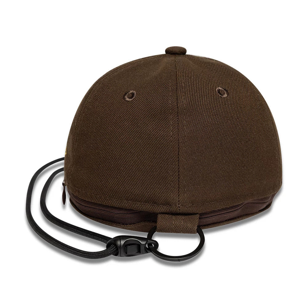 New Era Year Of The Horse Dark Brown Cap Pouch, rear view with a drawstring closure, showing the top button and eyelets on a textured dark brown fabric, featuring a black cord and hook for attachment.