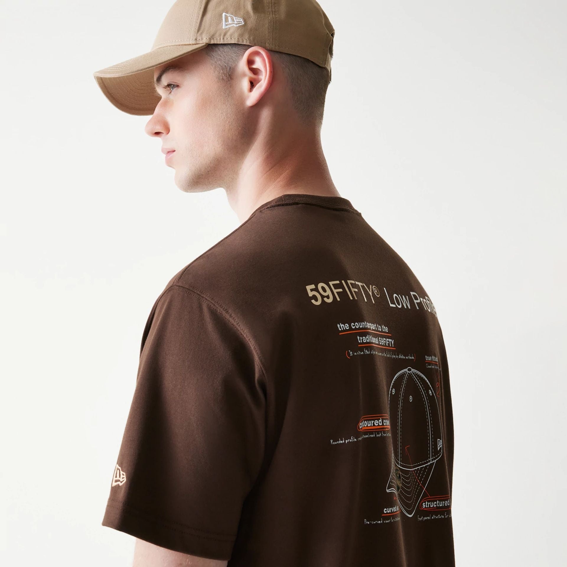 The Male model is wearing Low Profile 59FIFTY Fitted Cap Description Brown T-Shirt 2