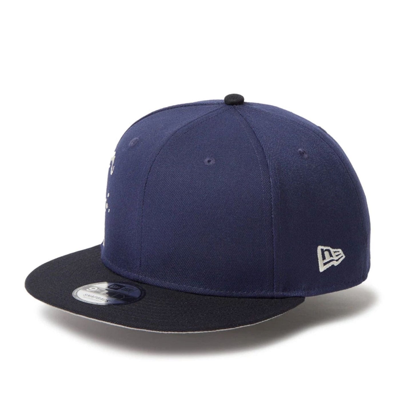 This is a New Era Dripping Emblem Navy 9FIFTY Snapback Adjustable Cap 3