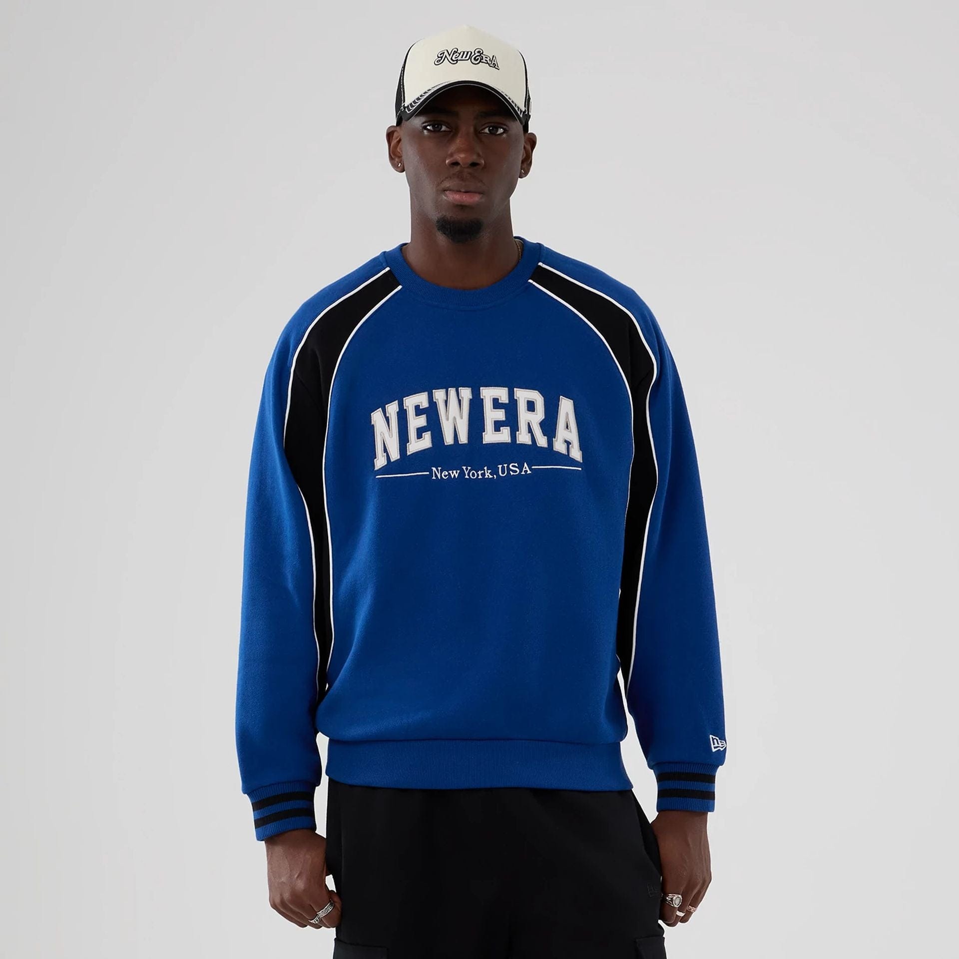 The Male model is wearing New Era Colour Block Navy Crew Neck Sweater 1