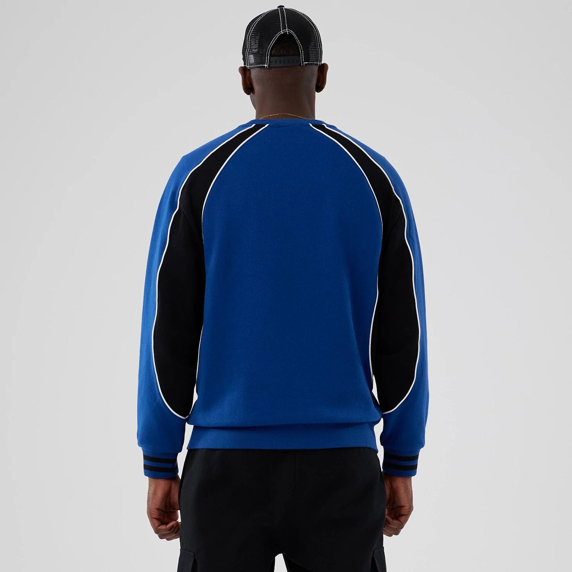 The Male model is wearing New Era Colour Block Navy Crew Neck Sweater 2