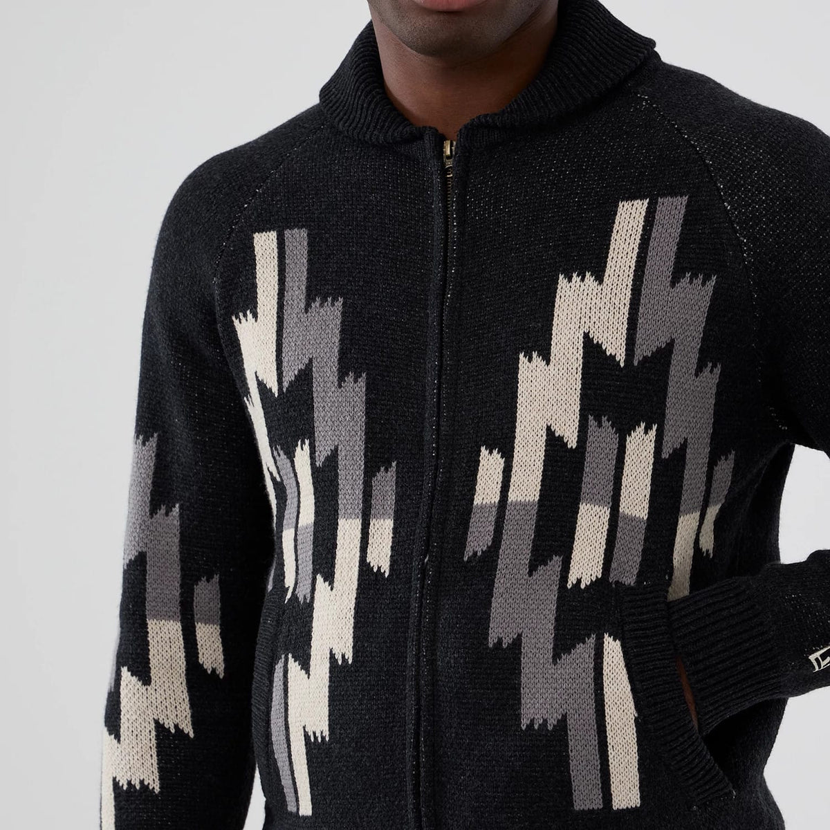 The Male model is wearing New Era Organic Cowichan Black Cardigan 3