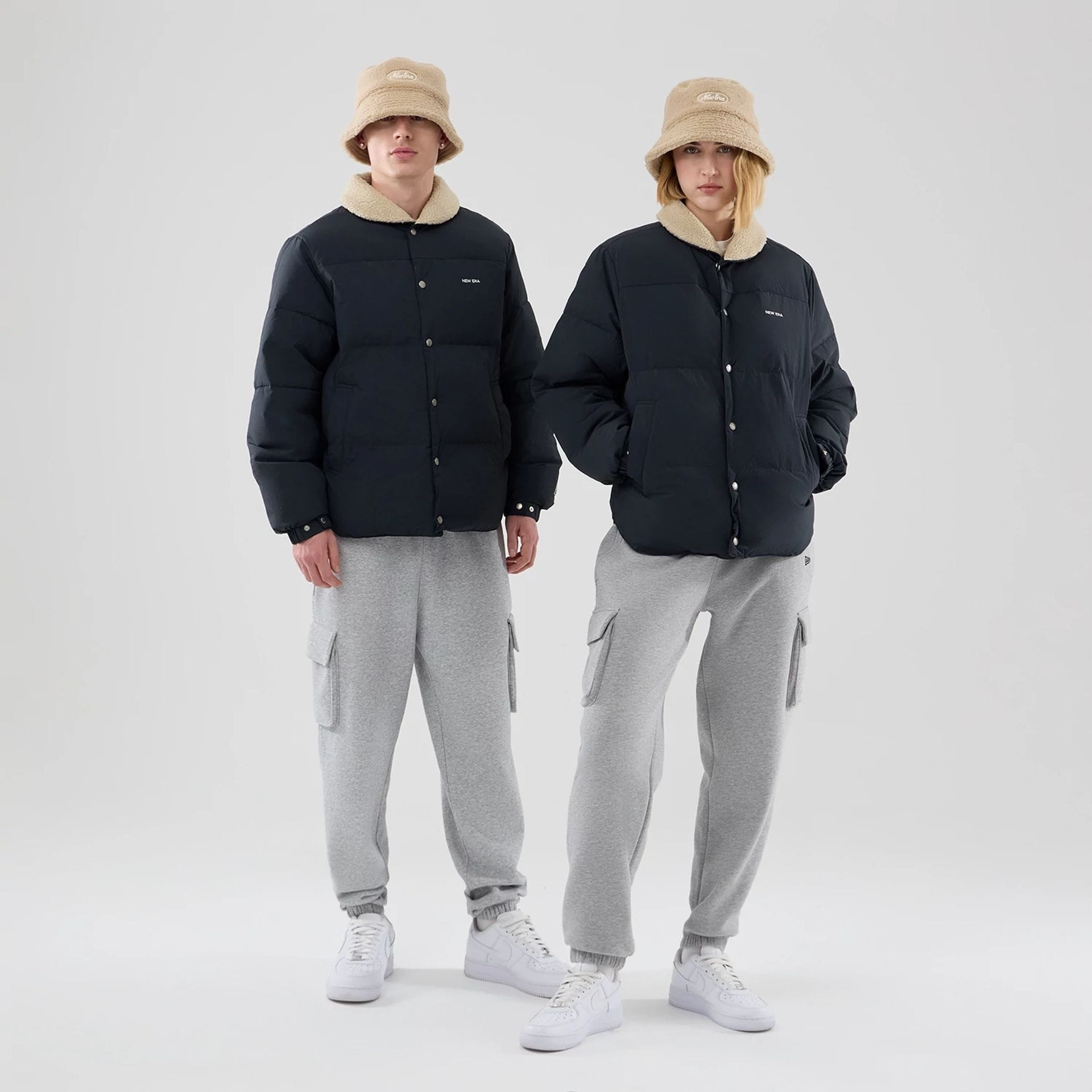 The Male model is wearing New Era Organic Boa Neck Navy Jacket 1