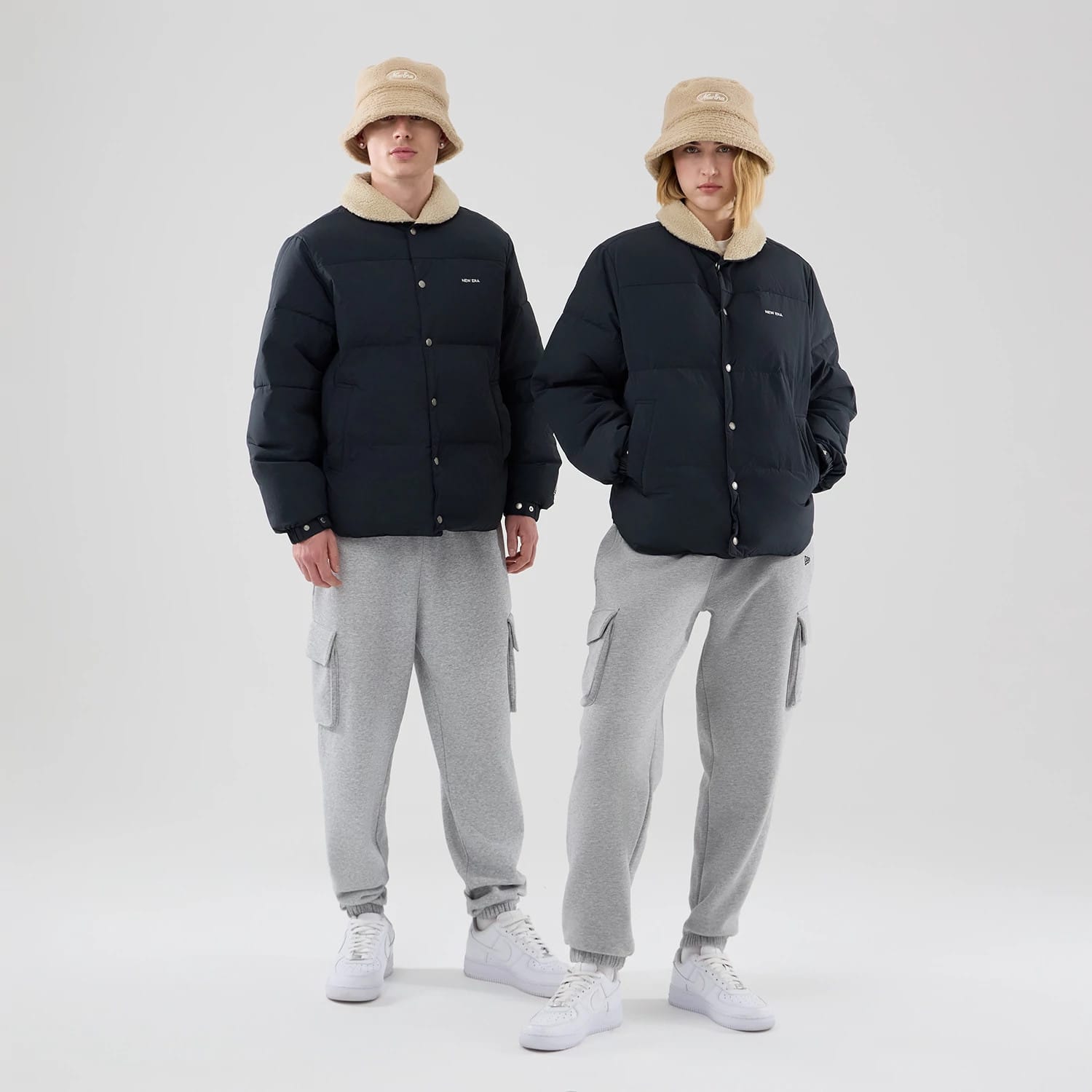 The Male model is wearing New Era Organic Boa Neck Navy Jacket 1