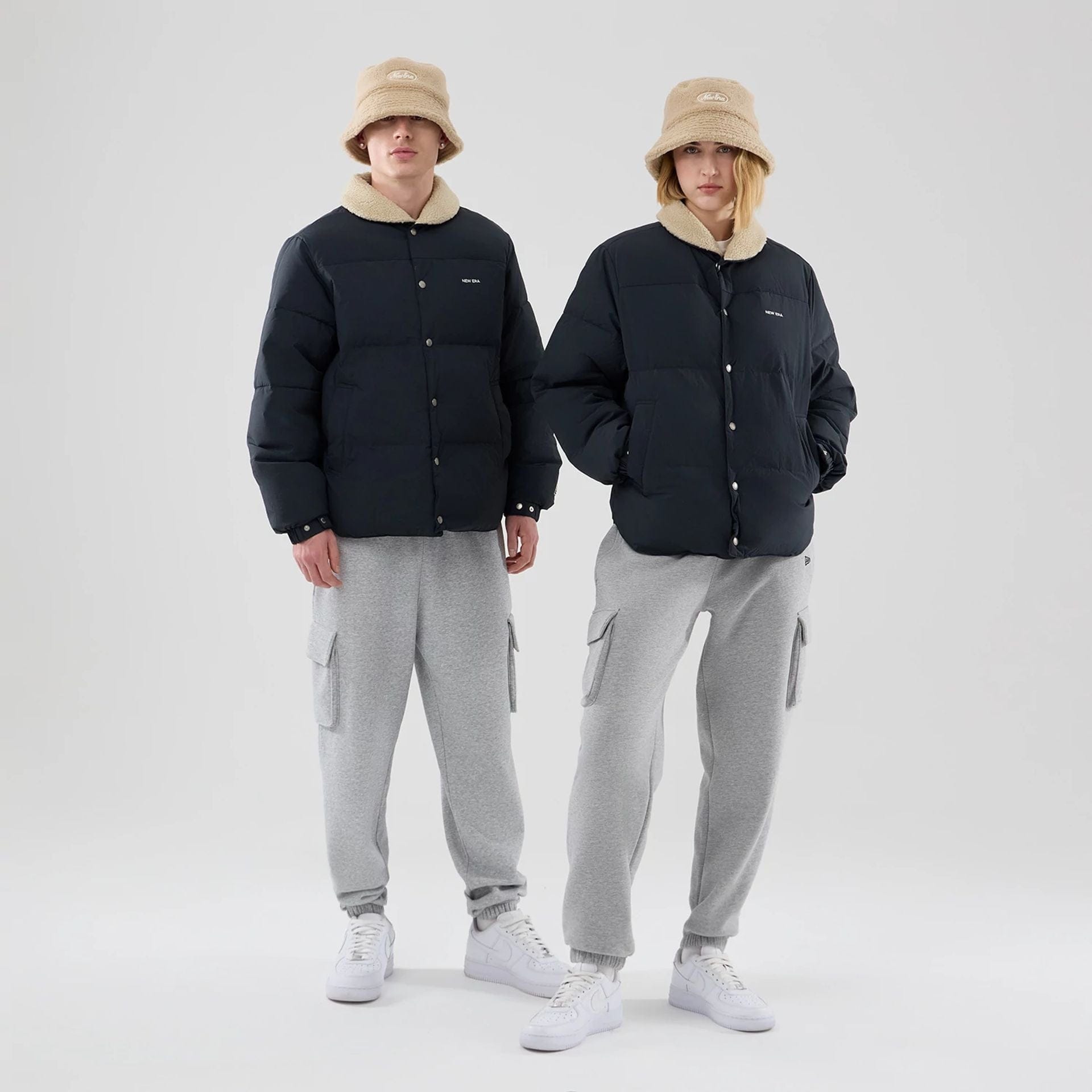 The Male model is wearing New Era Organic Boa Neck Navy Jacket 1