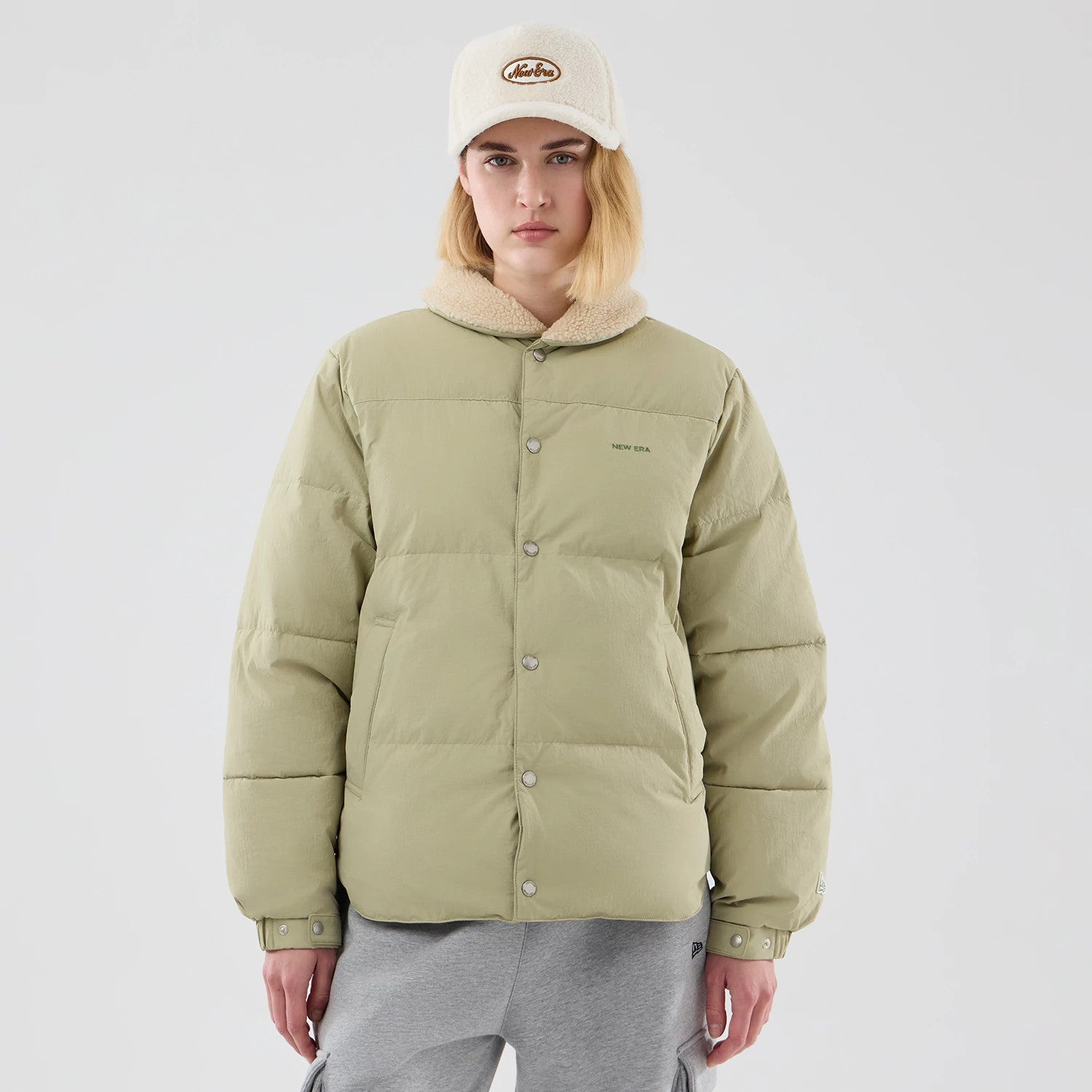 The Male model is wearing New Era Organic Boa Neck Khaki Jacket 4