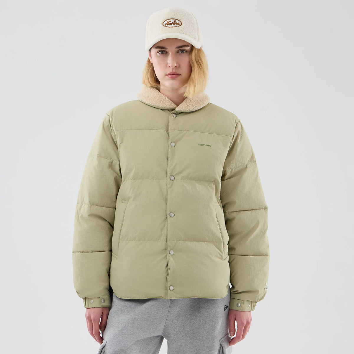 The Male model is wearing New Era Organic Boa Neck Khaki Jacket 4