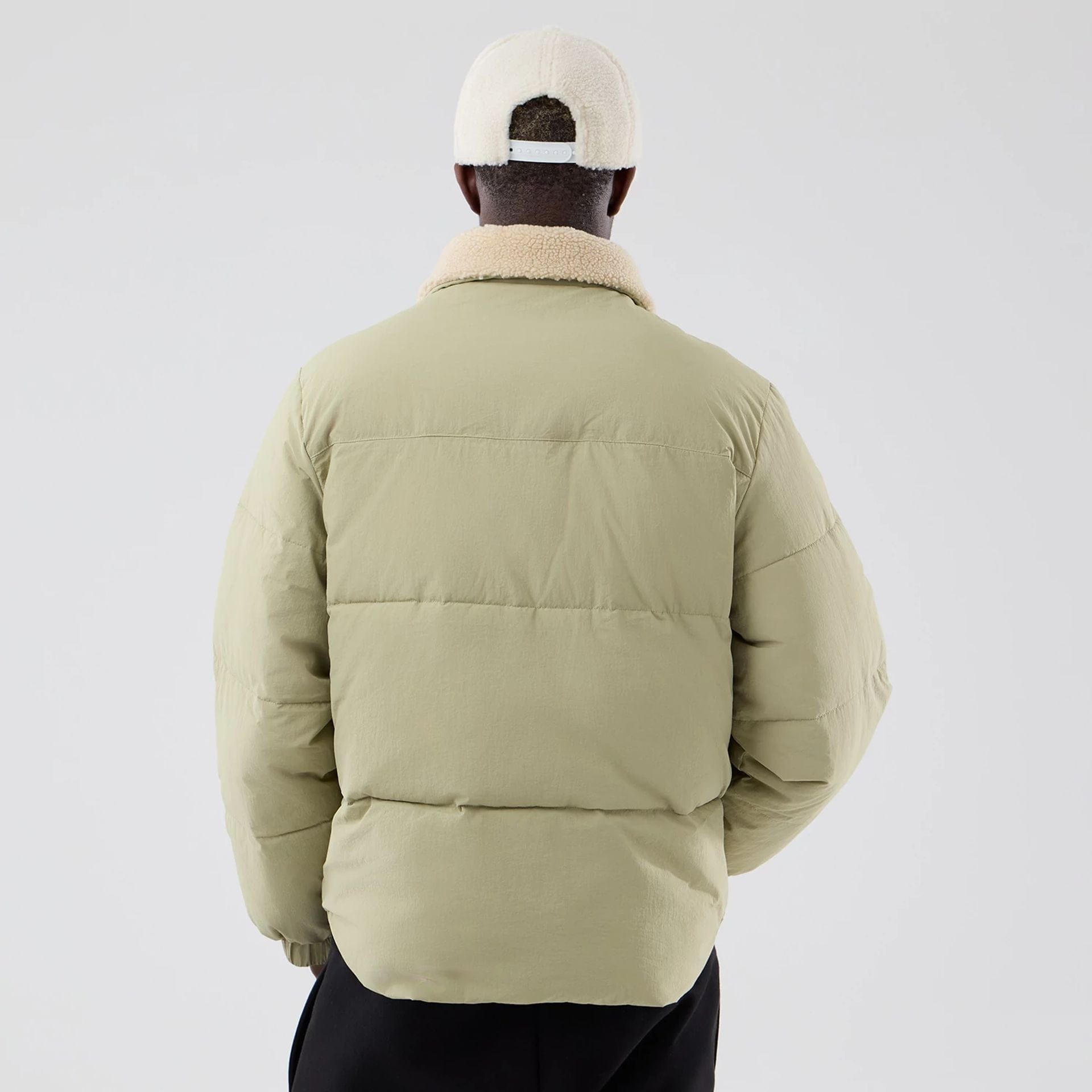 The Male model is wearing New Era Organic Boa Neck Khaki Jacket 2