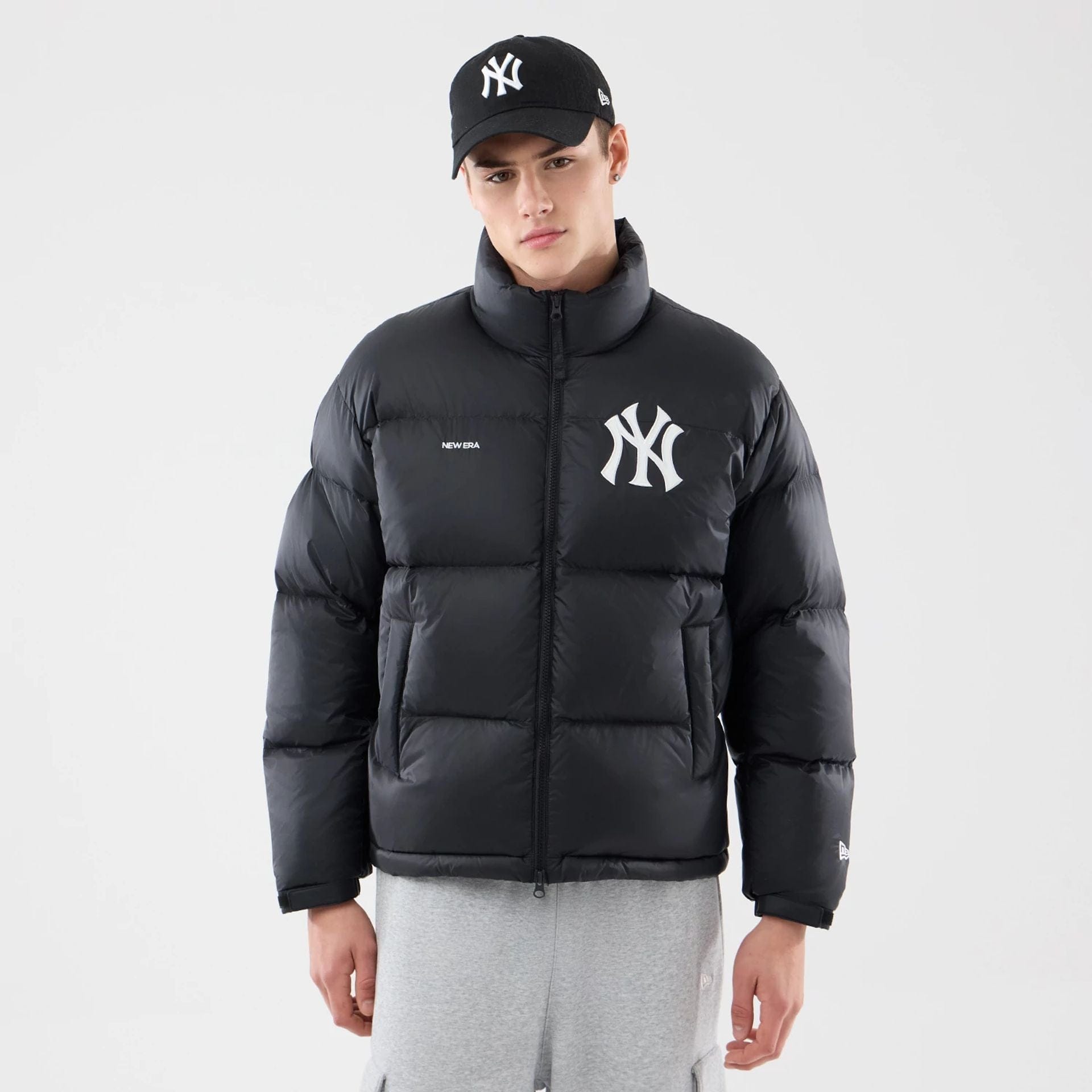 The Male model is wearing New York Yankees MLB Black Puffer Down Jacket 1