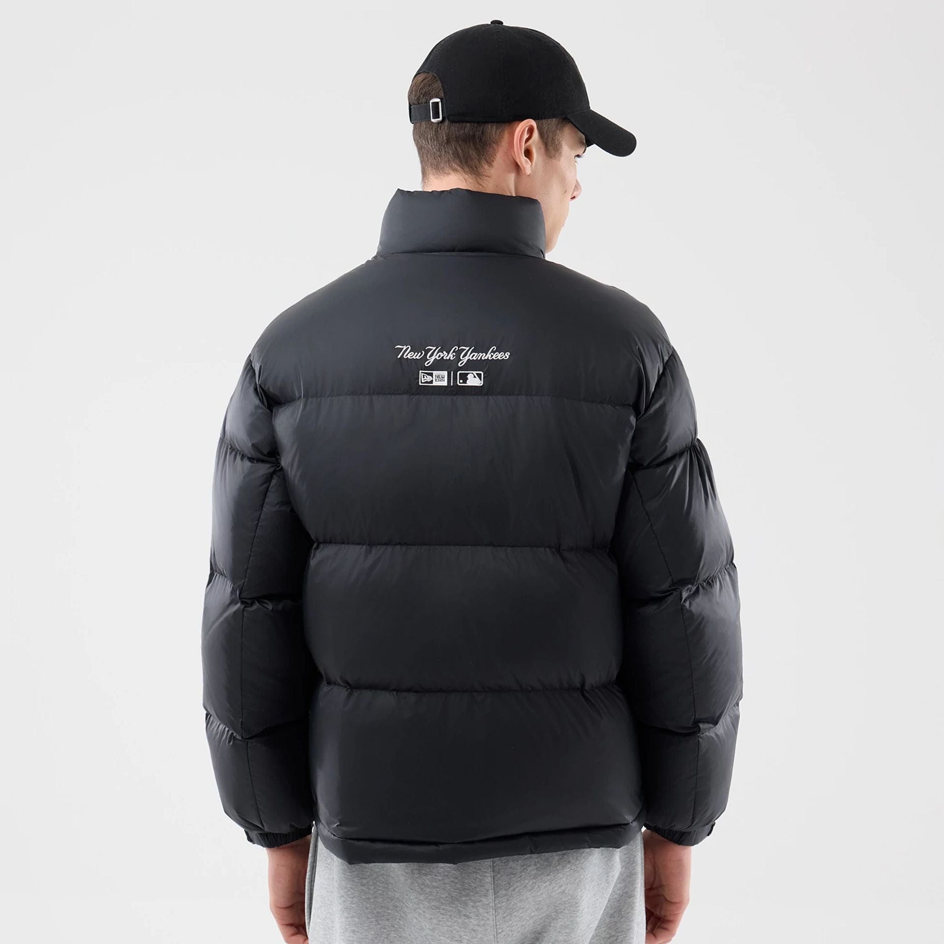 The Male model is wearing New York Yankees MLB Black Puffer Down Jacket 2