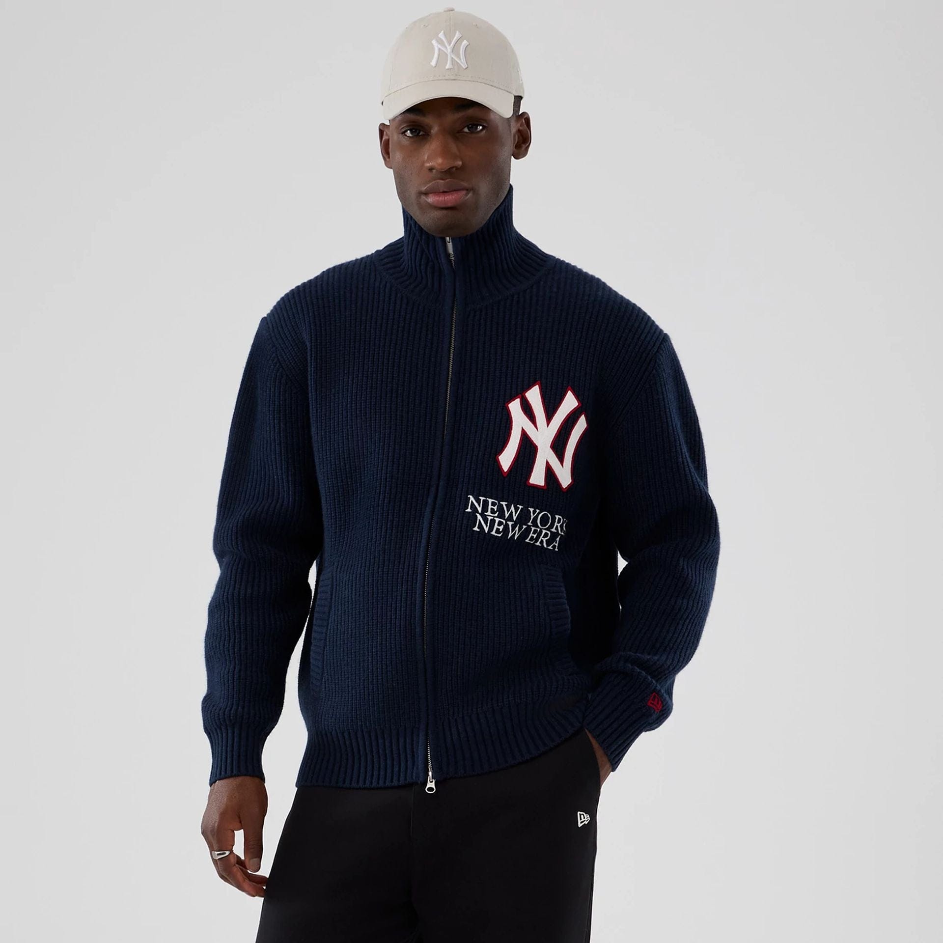 The Male model is wearing New York Yankees MLB Navy Cardigan 1