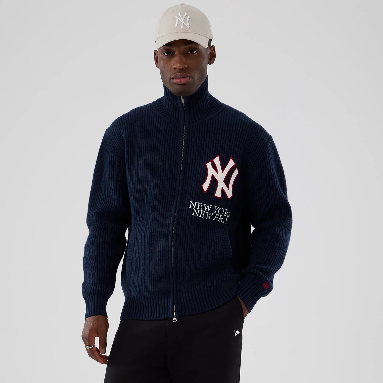The Male model is wearing New York Yankees MLB Navy Cardigan 1
