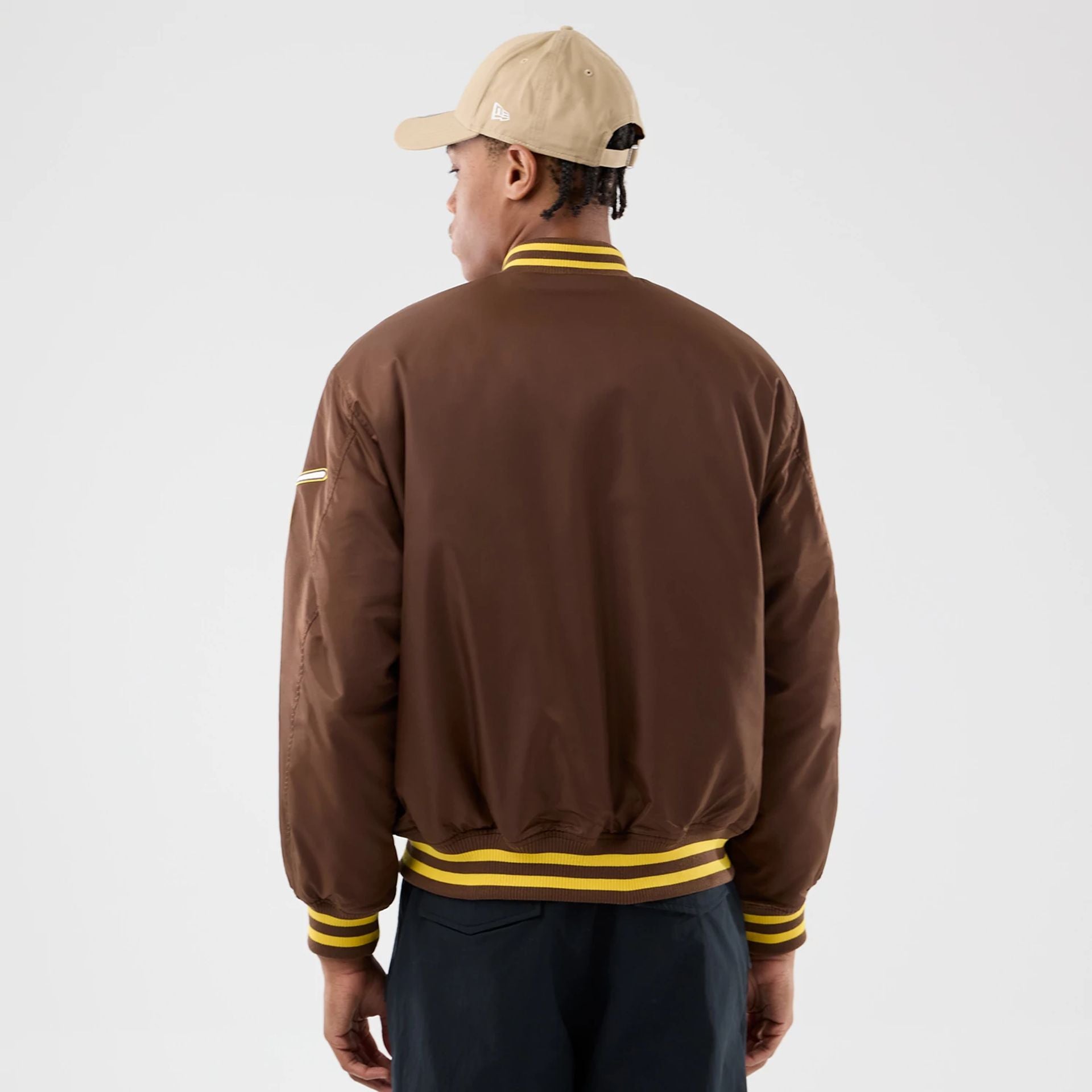 The Male model is wearing San Diego Padres MLB Authentic Dark Brown Stadium Jacket 2