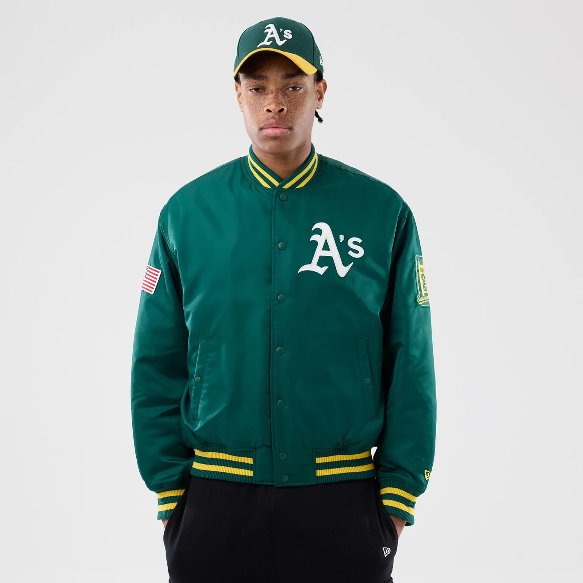 The Male model is wearing Oakland Athletics MLB Authentic Green Stadium Jacket 1