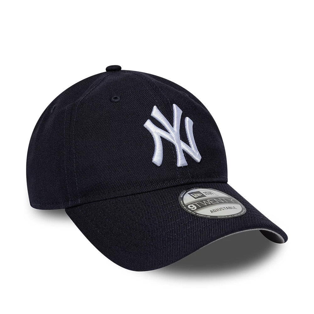 New York Yankees MLB Wool Navy New Era 9TWENTY Adjustable Cap, three-quarter view showing the raised white embroidered NY logo on the front panel and the 9TWENTY size sticker on the curved navy visor.
